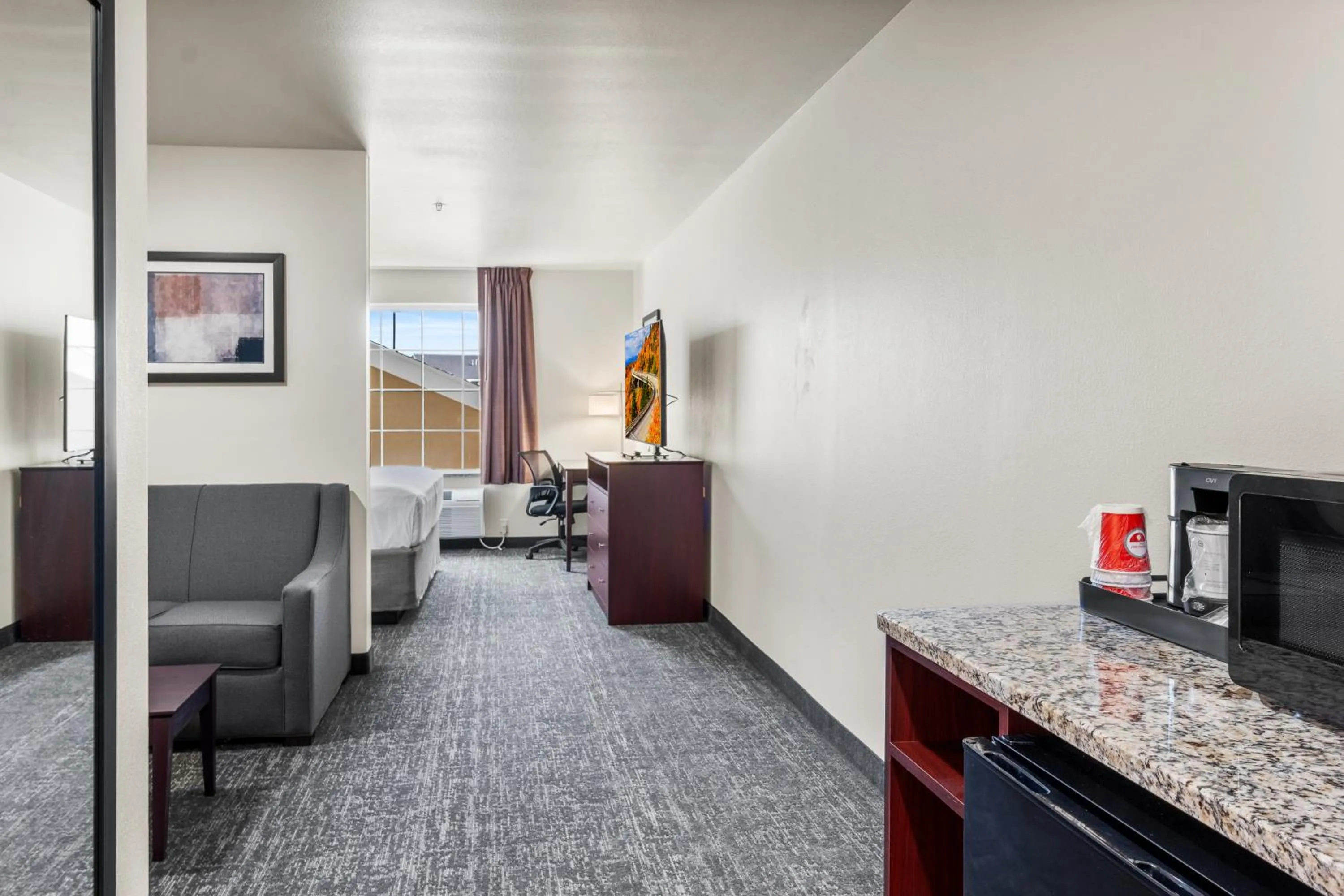 Bedroom in Cobblestone Hotel & Suites Denmark - Green Bay