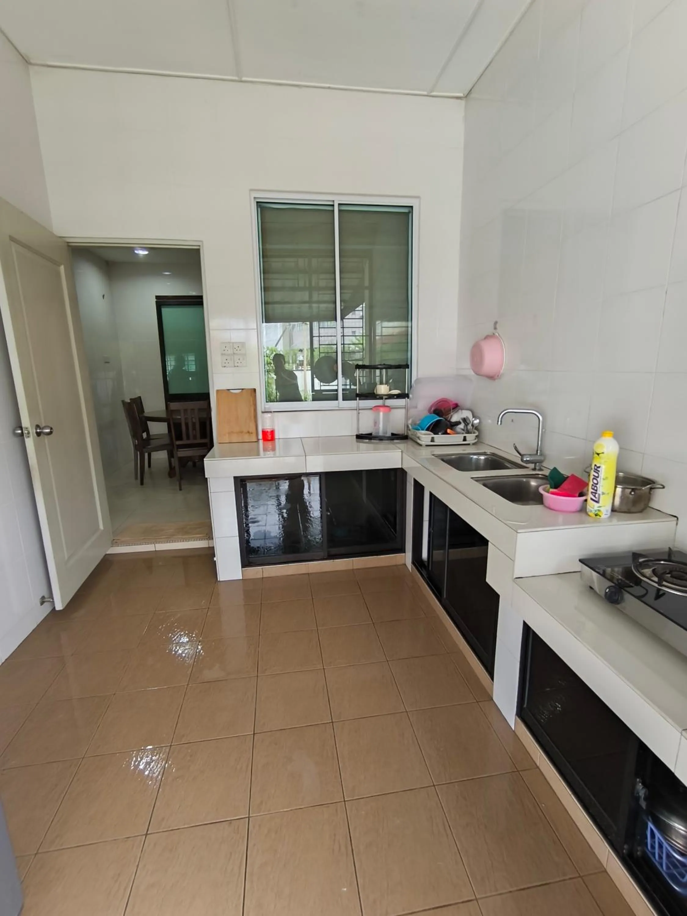 Kitchen or kitchenette in Natol Homestay - Moyan Batu Kawa