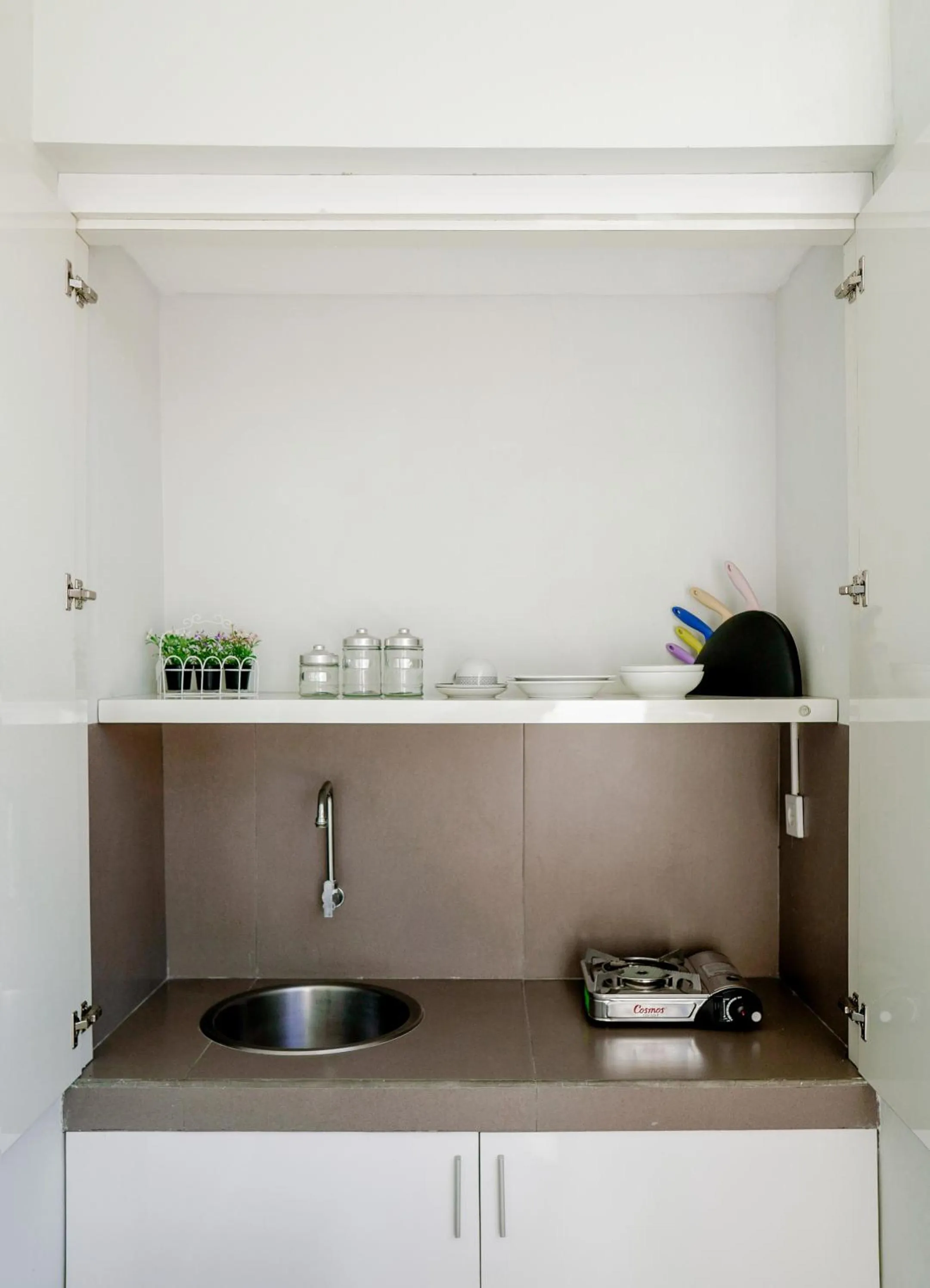 Kitchen or kitchenette in Cozy Stay Bali by ARM Hospitality