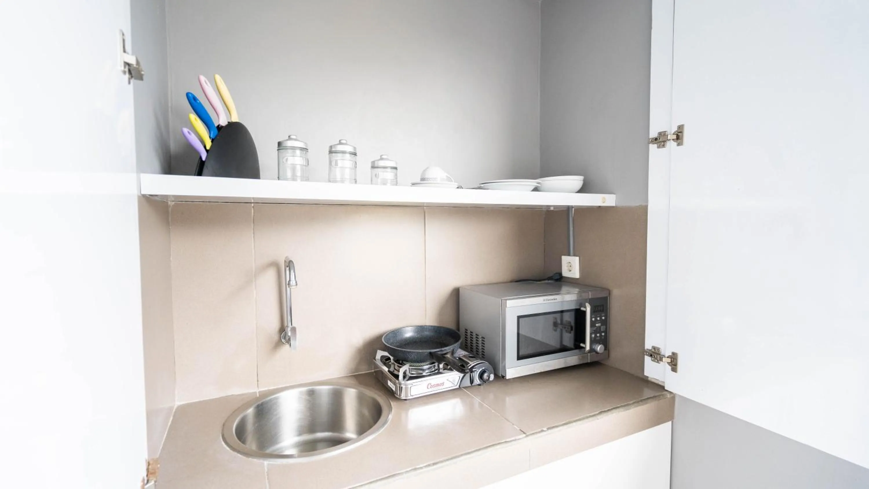 Kitchen or kitchenette in Cozy Stay Bali by ARM Hospitality