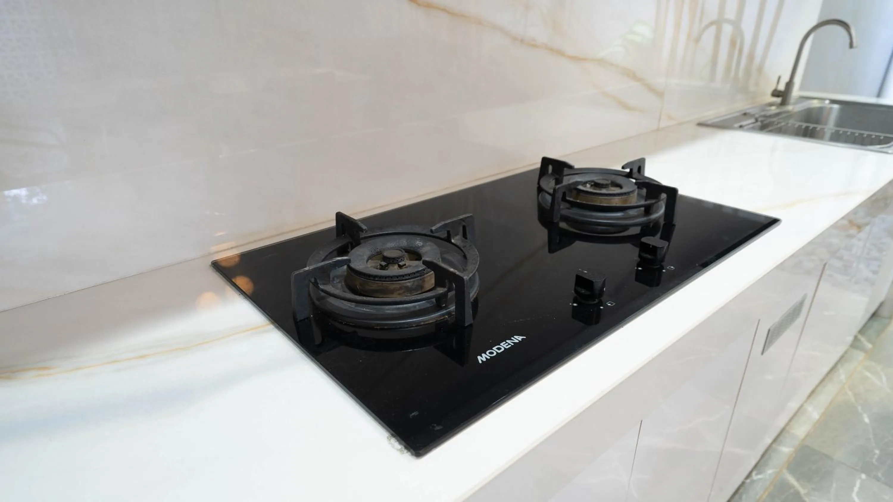 kitchen in Cozy Stay Bali by ARM Hospitality