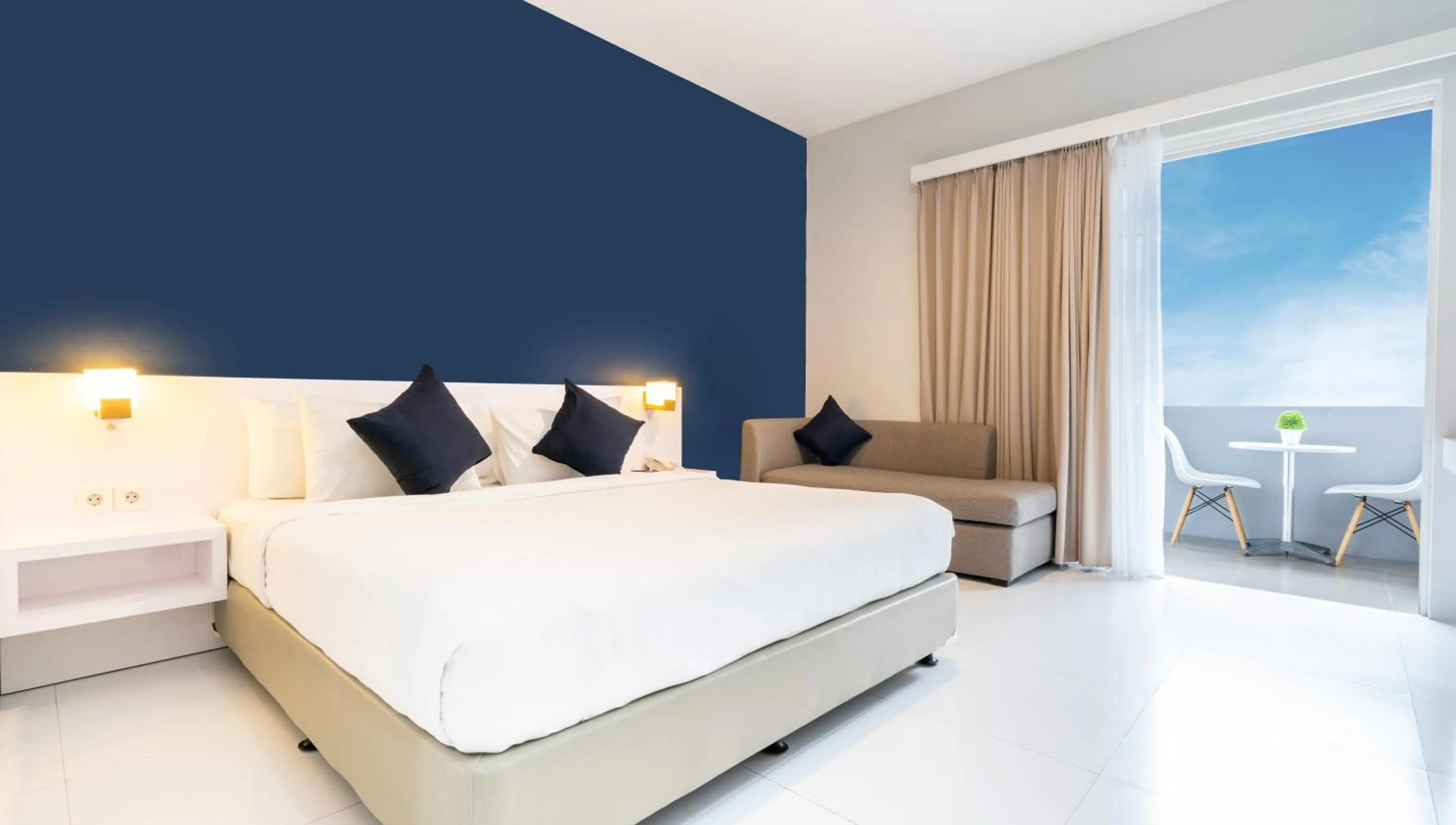 Bed in Cozy Stay Bali by ARM Hospitality