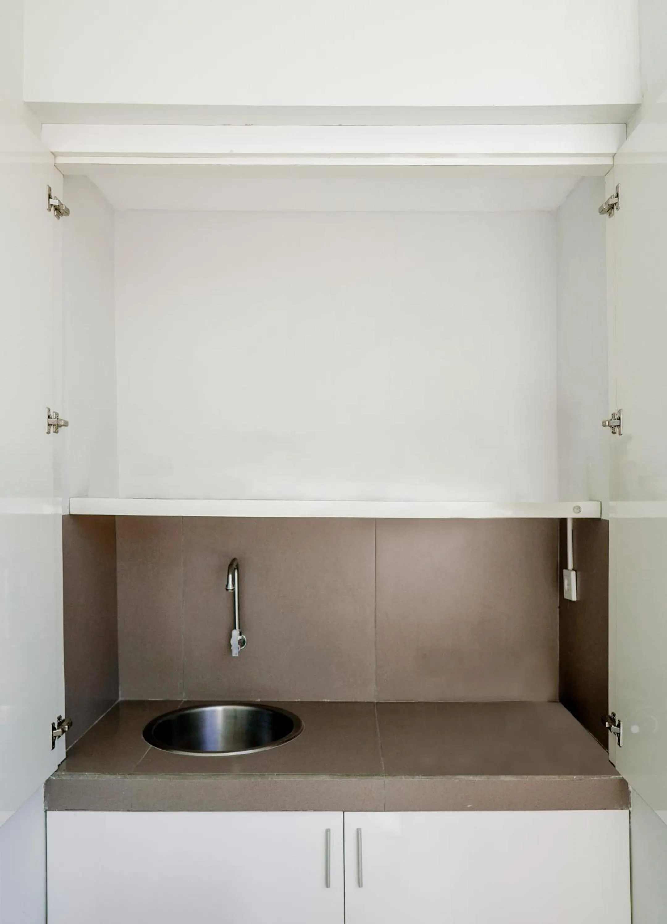 Kitchen or kitchenette in Cozy Stay Bali by ARM Hospitality