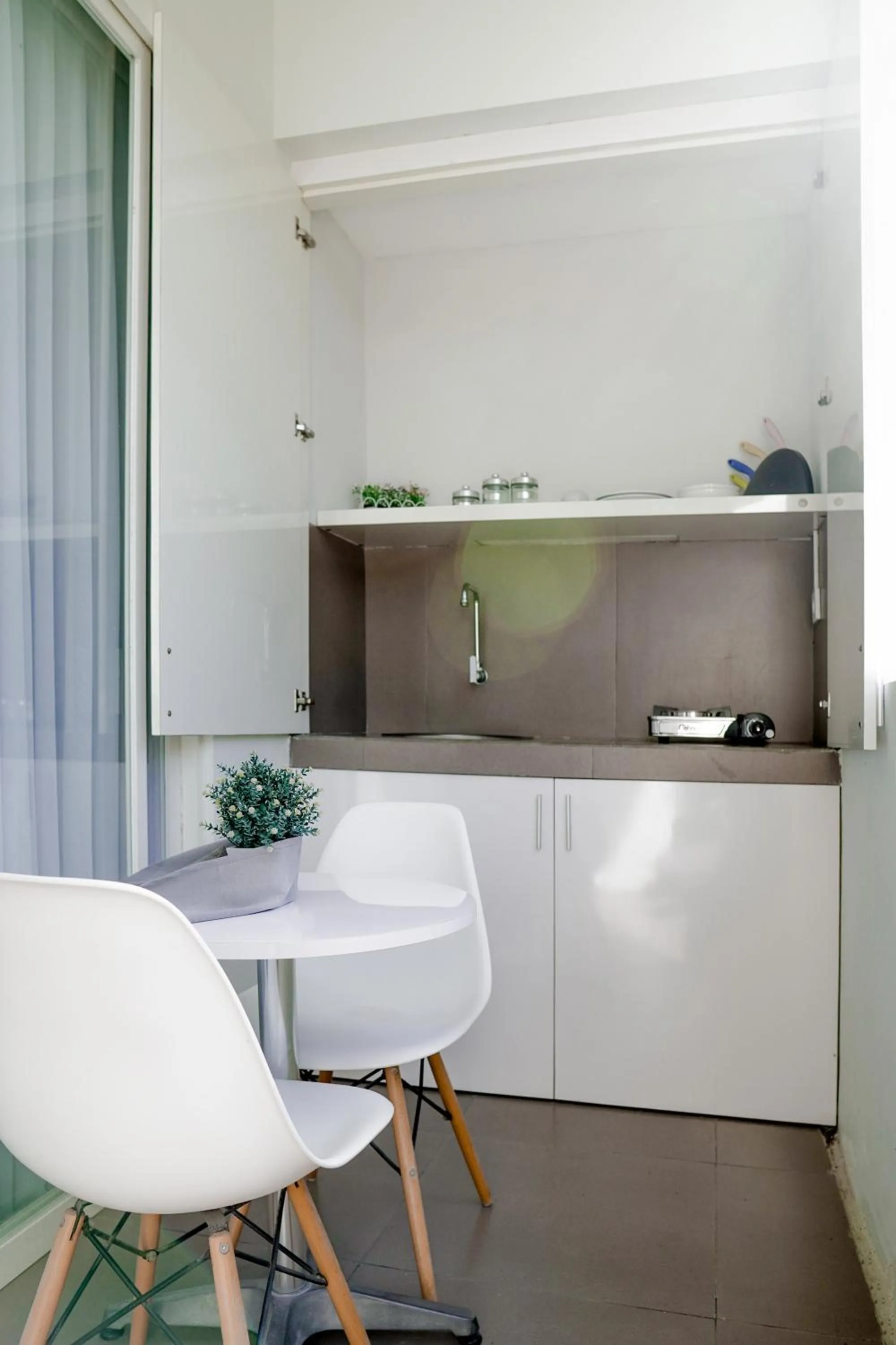Kitchen or kitchenette in Cozy Stay Bali by ARM Hospitality