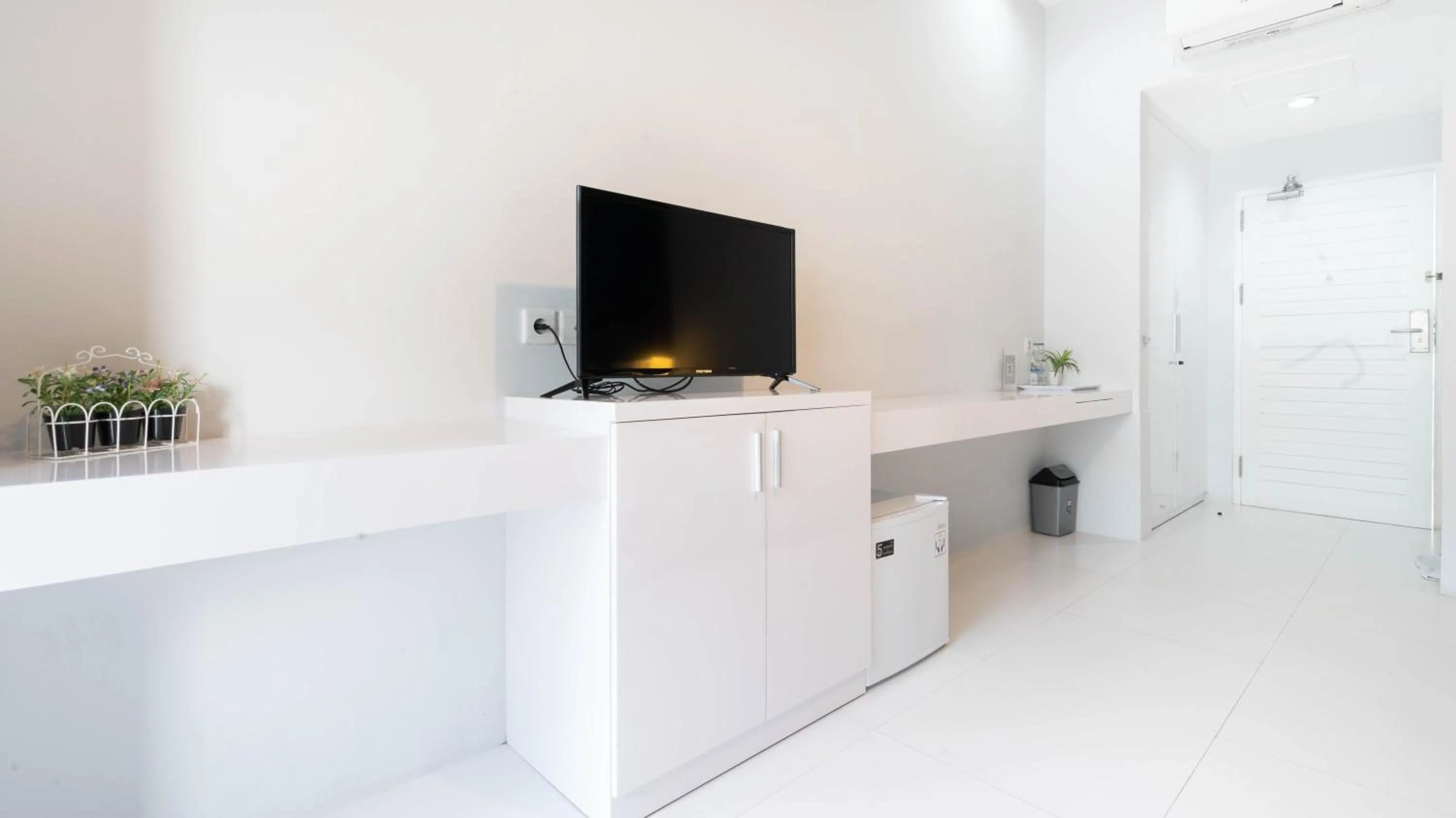 TV and multimedia in Cozy Stay Bali by ARM Hospitality