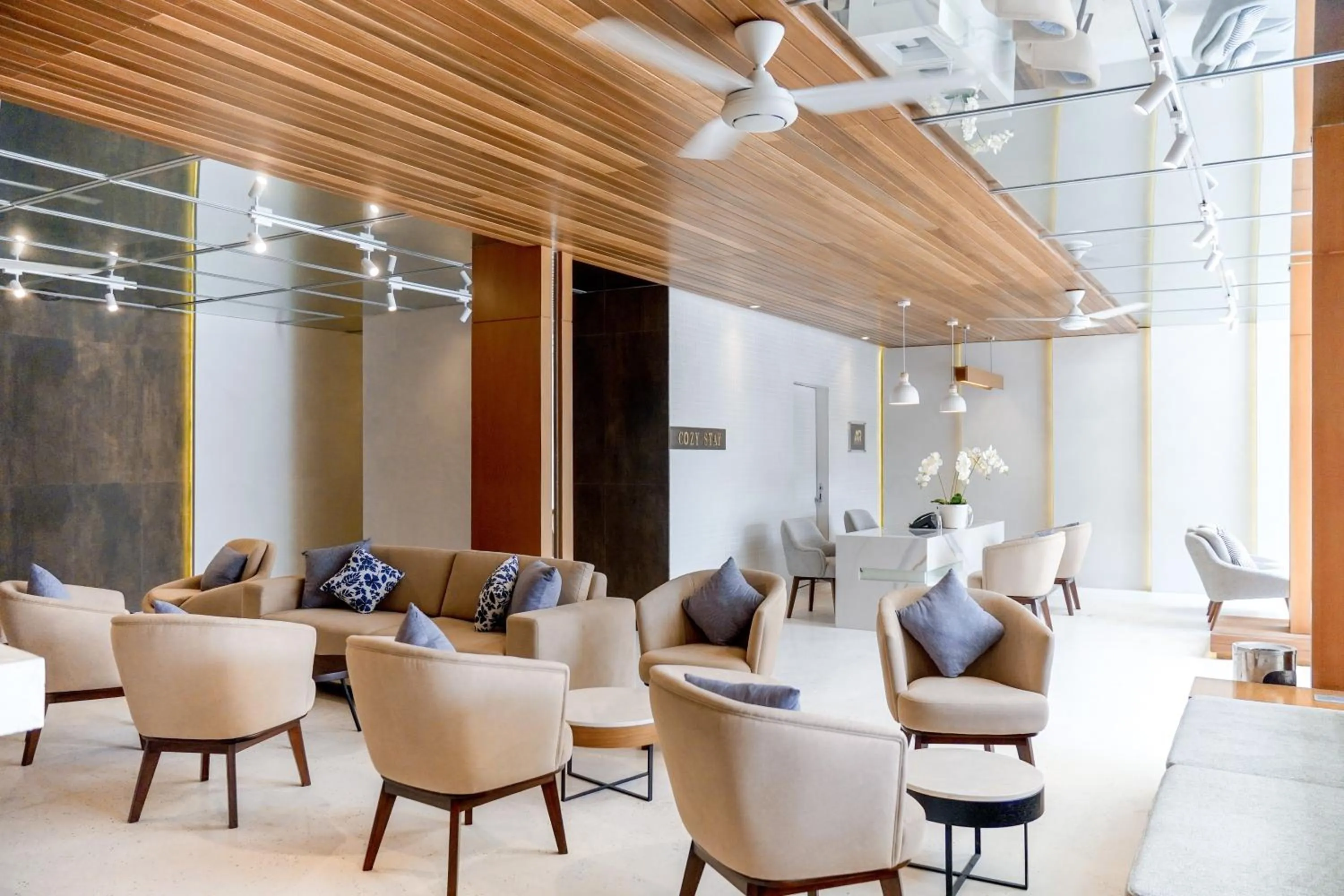 Seating area in Cozy Stay Bali by ARM Hospitality