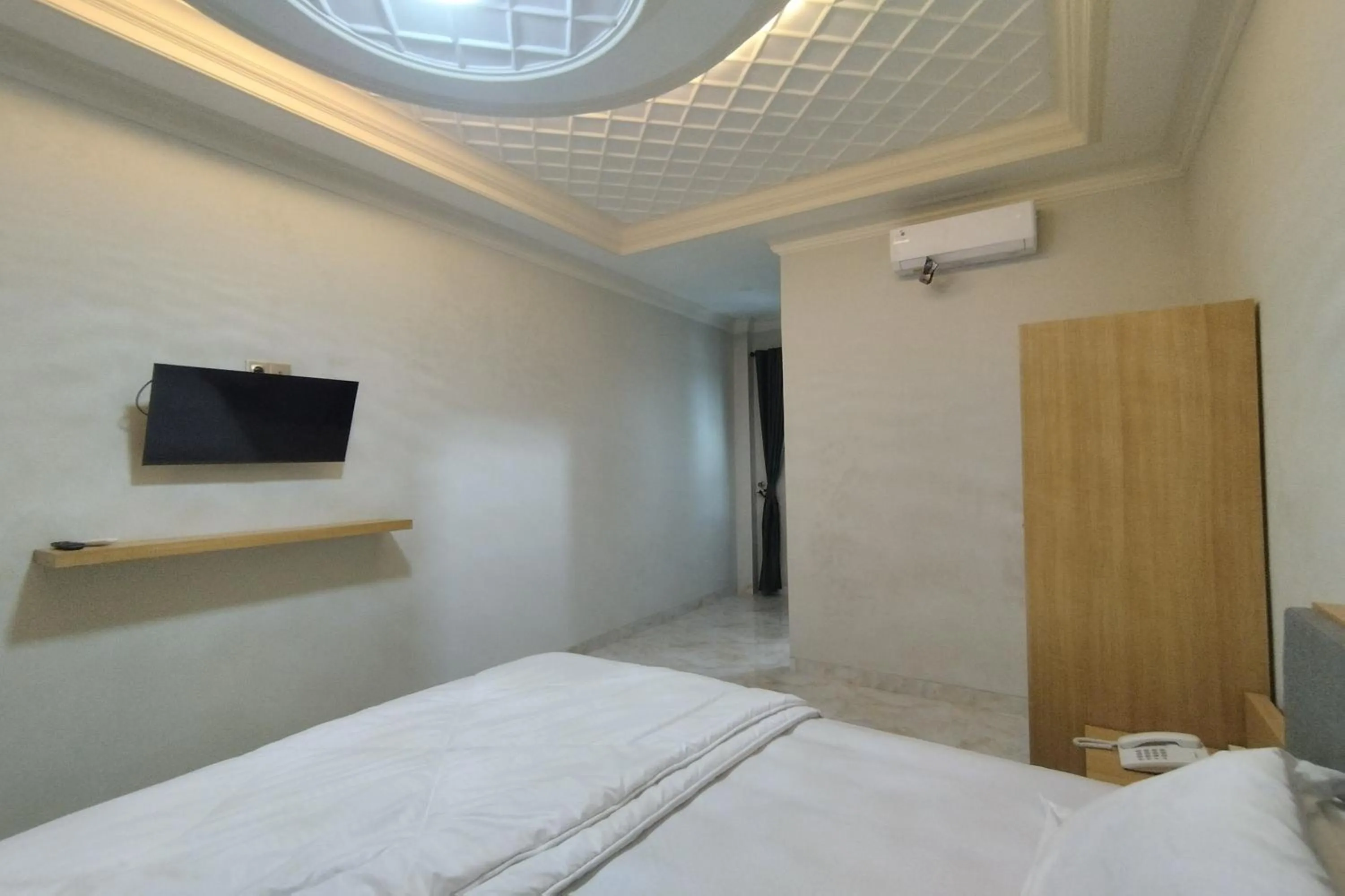 Bedroom, Bed in Maulidia Hotel Syariah & Convention Center