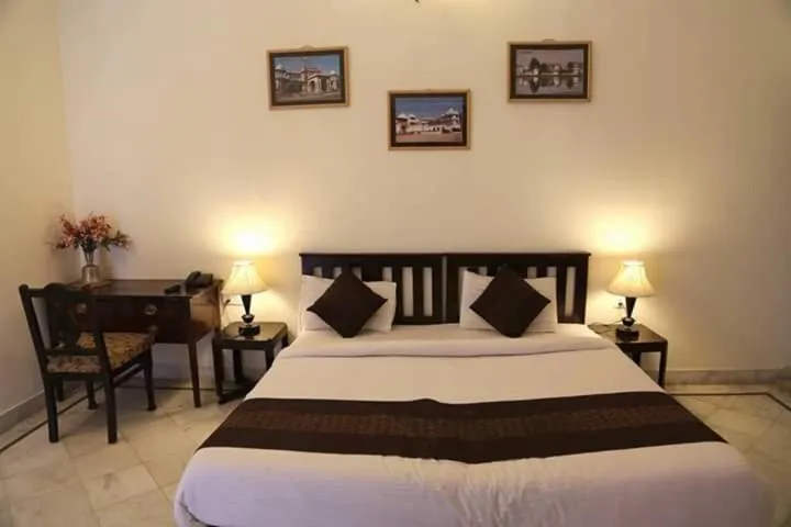 Bed in HOTEL KARAN VILLAS