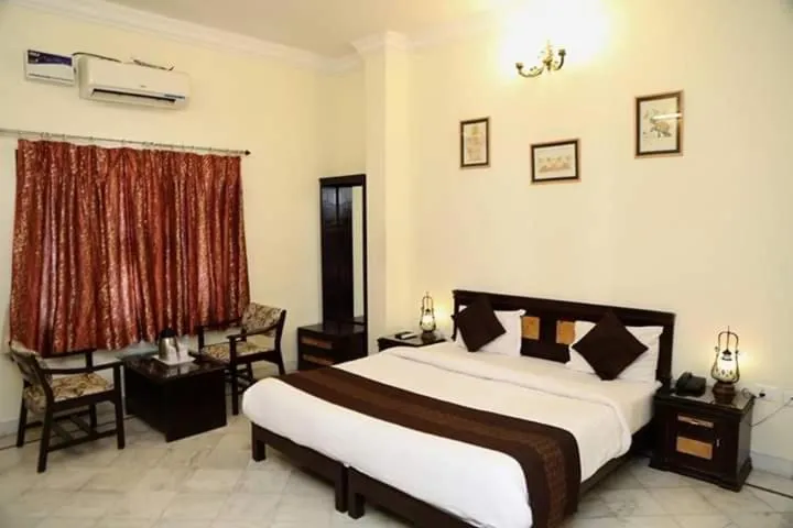 Bed in HOTEL KARAN VILLAS