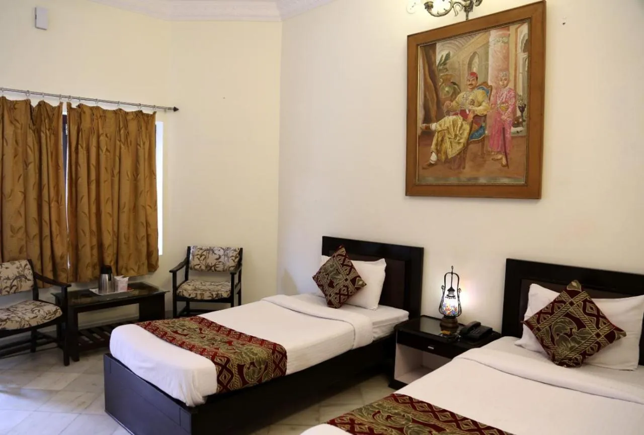 Bed in HOTEL KARAN VILLAS