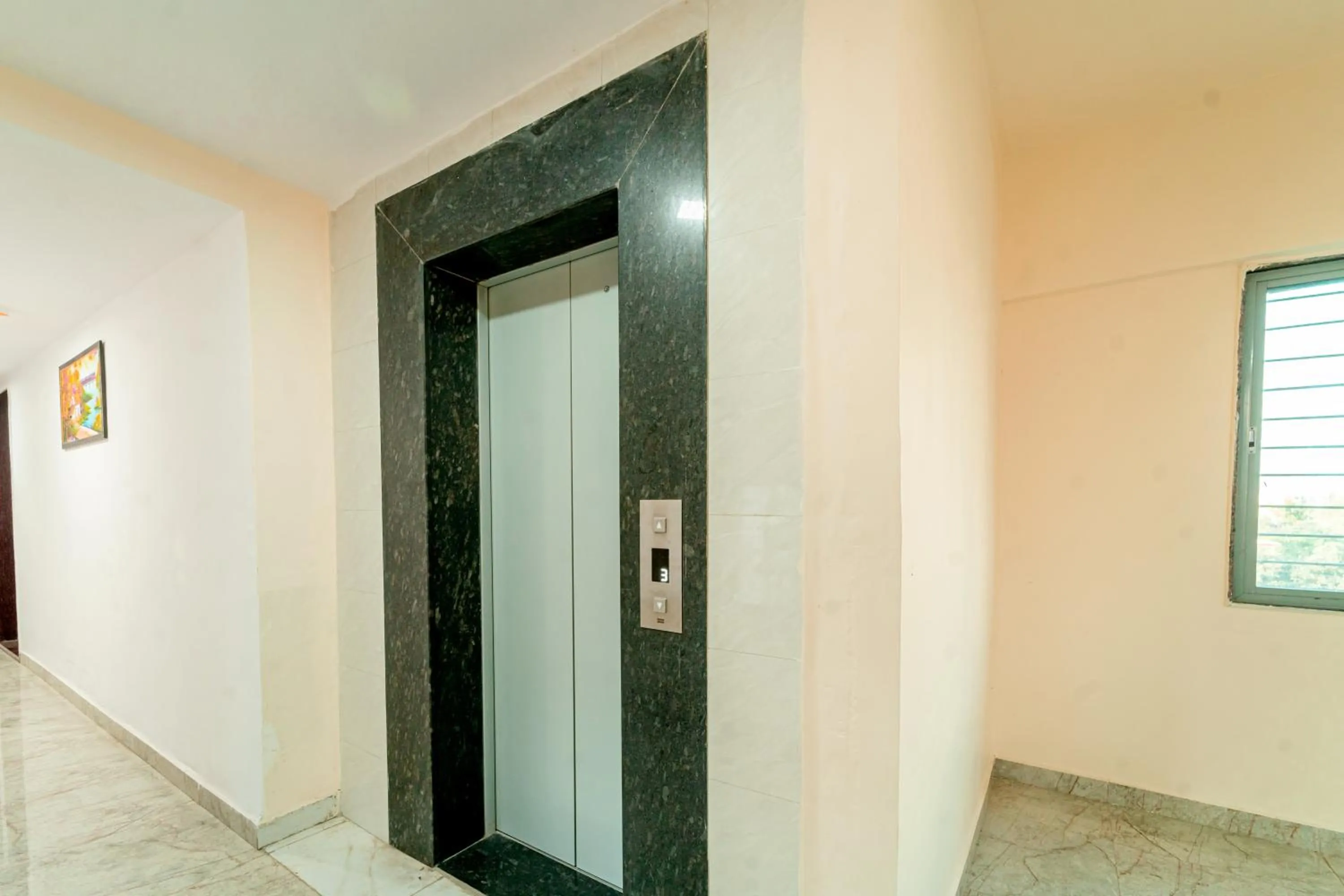 elevator in Itsy Hotels Anand Executive, Near Amanora