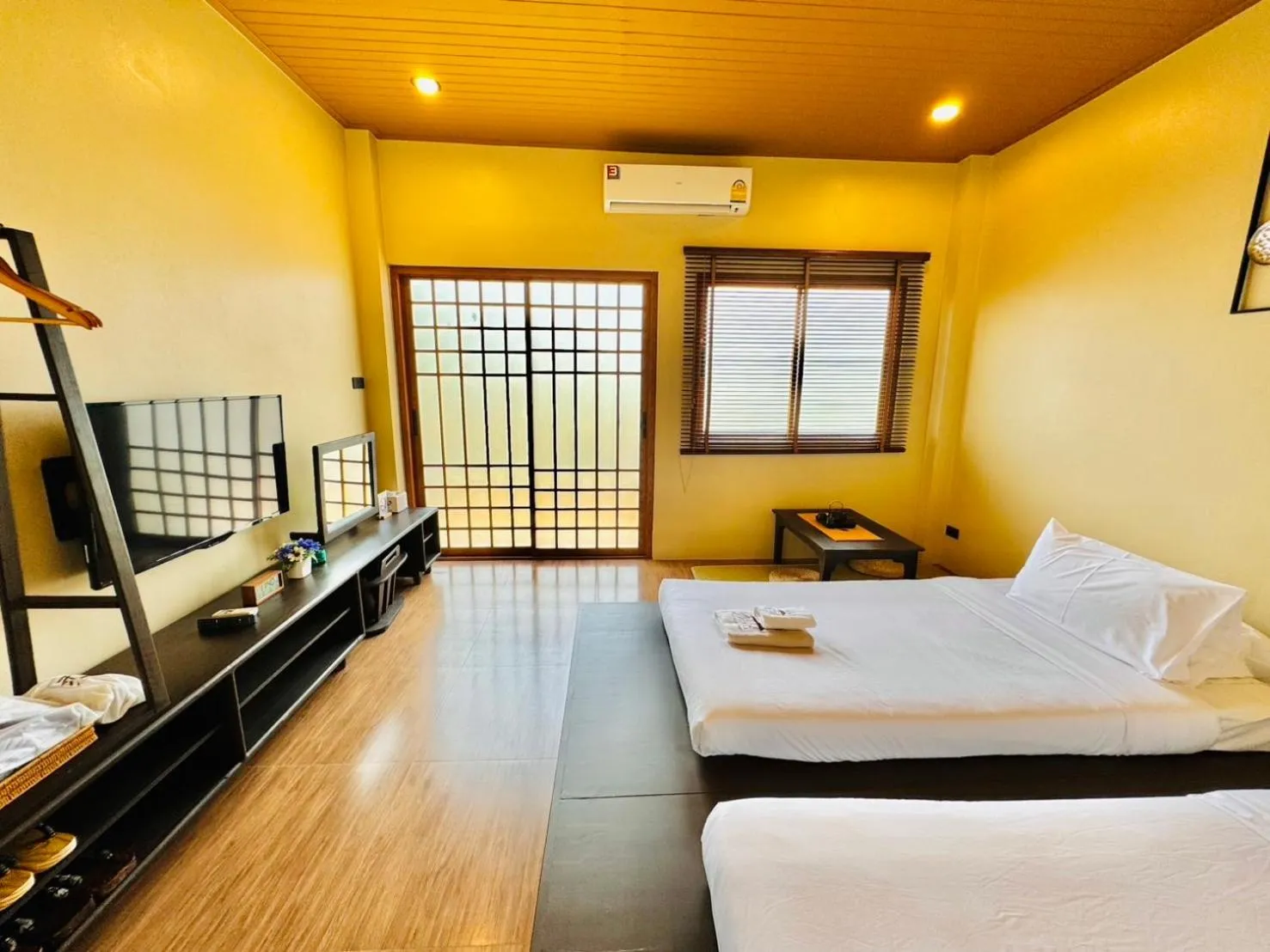 Photo of the whole room, Bed in COZY SHIROI RESORT