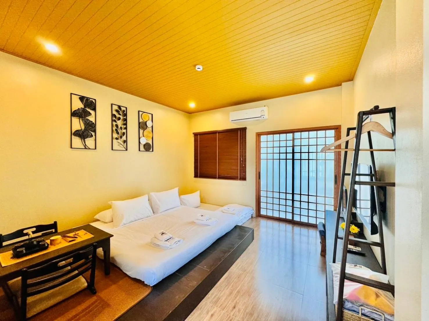 Bed in COZY SHIROI RESORT