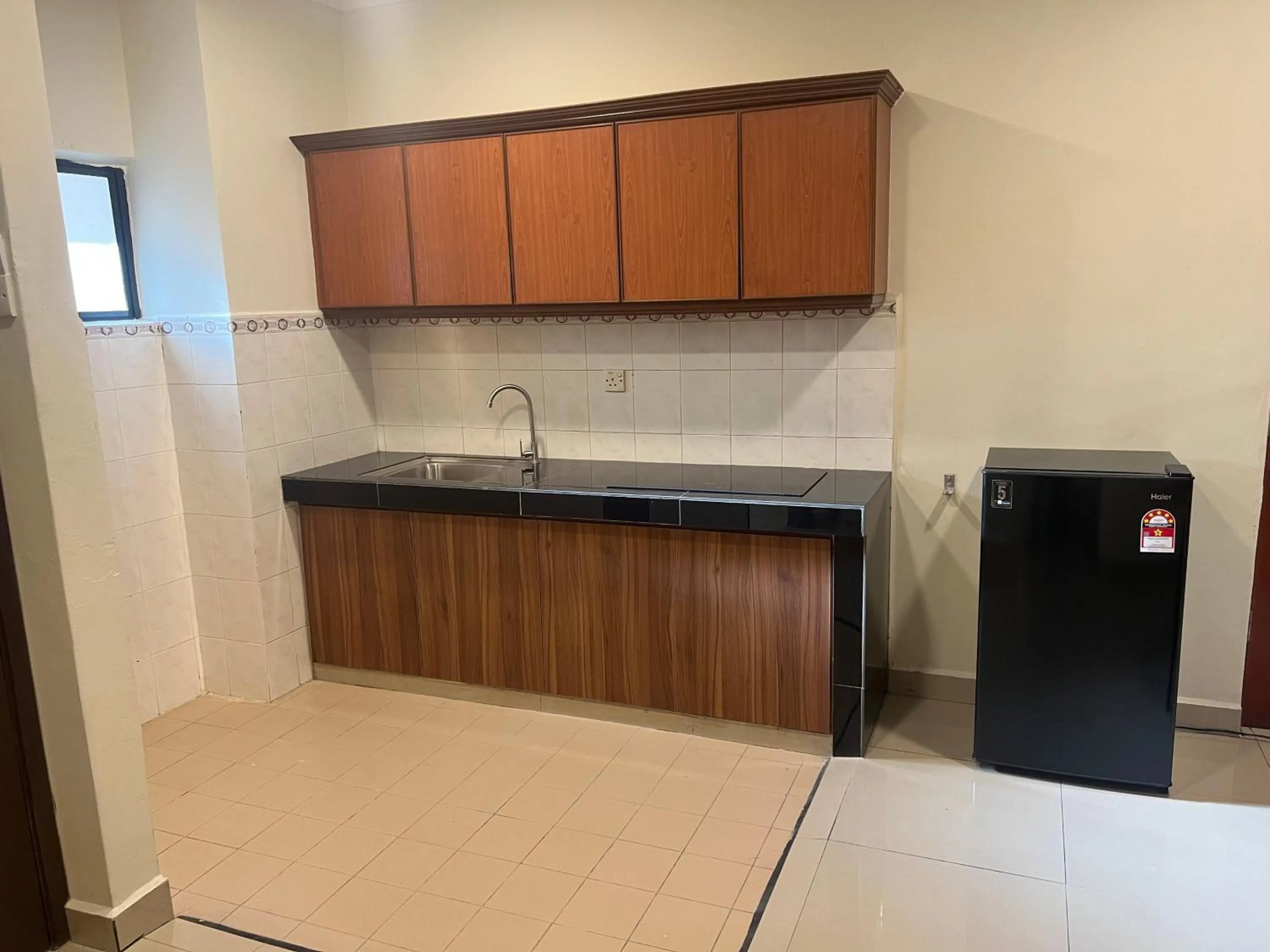 Kitchen or kitchenette in SGI Vacation Club Villa @ Damai Laut Holiday Resort