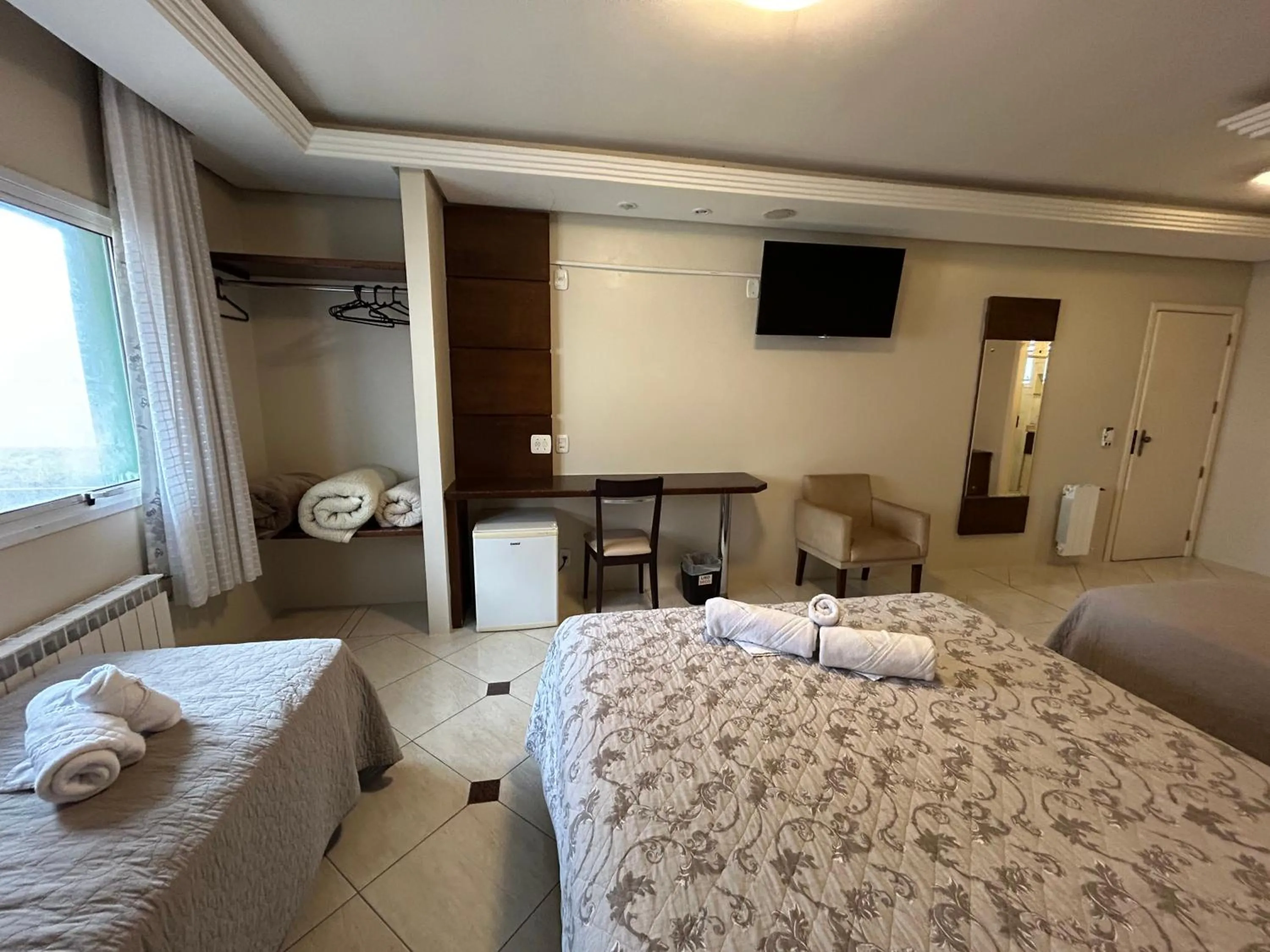 Bed in Pousada Stillo Gramado Via Serena