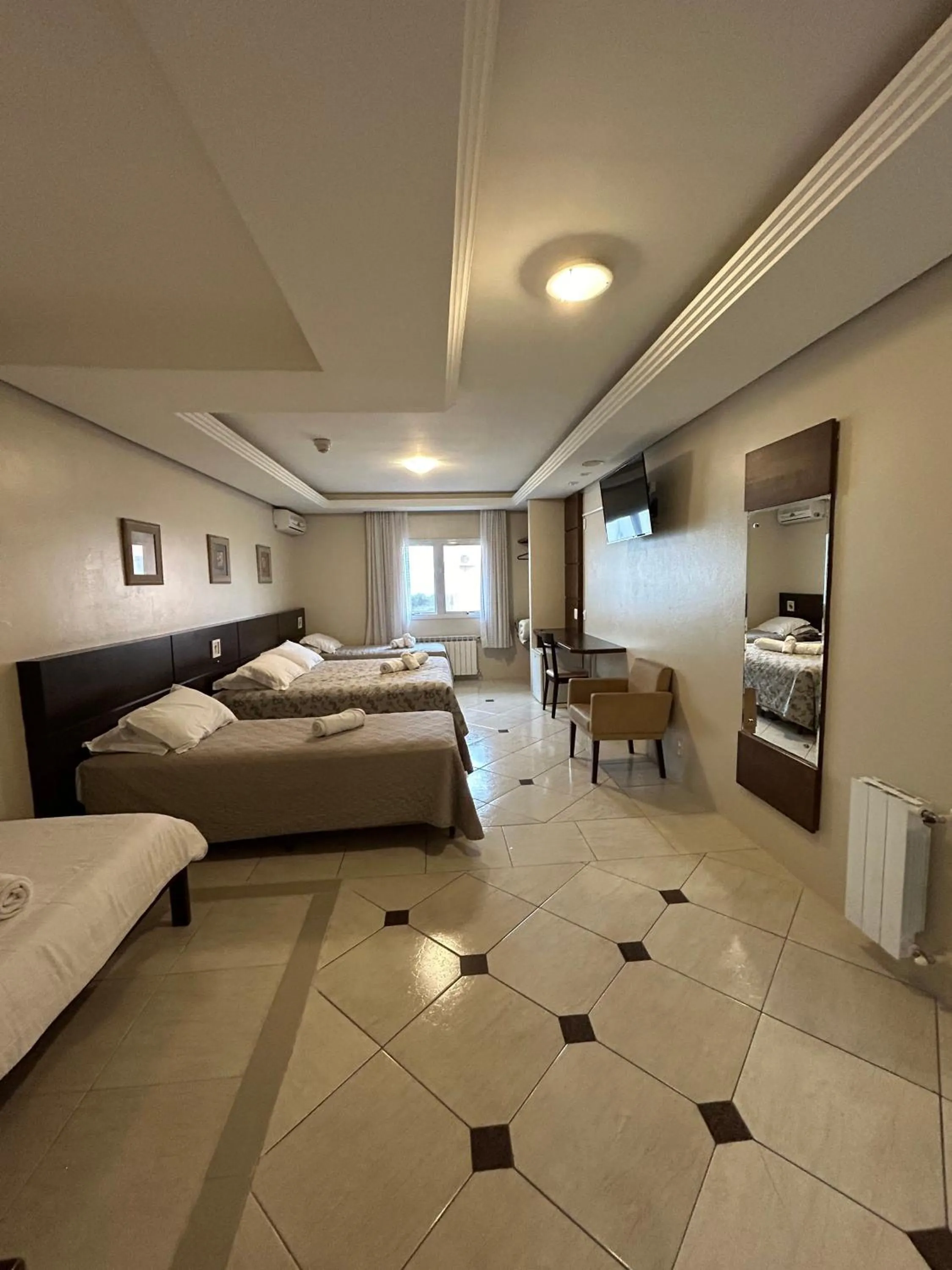 Bed in Pousada Stillo Gramado Via Serena