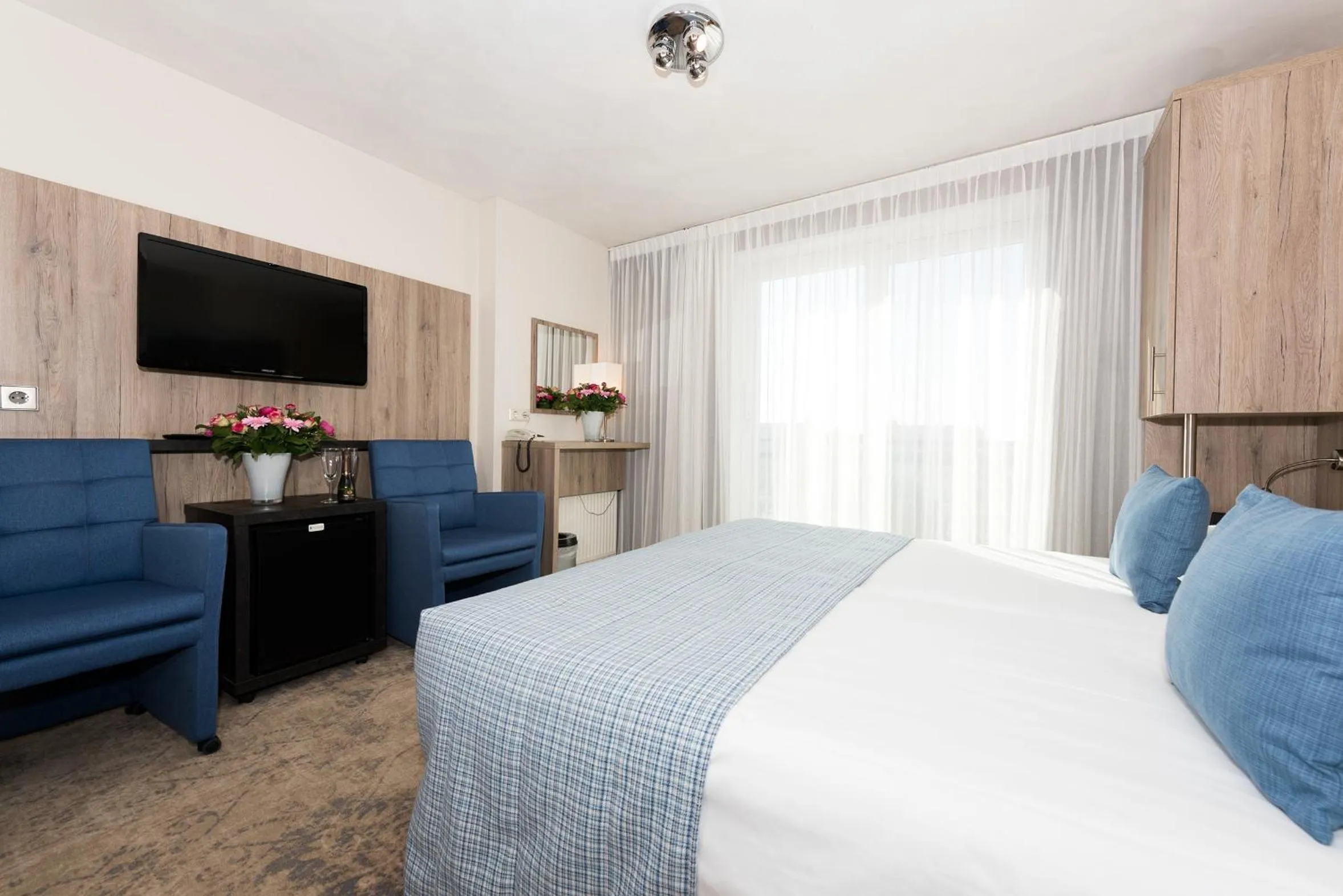 Photo of the whole room, Bed in Strandhotel de Vassy