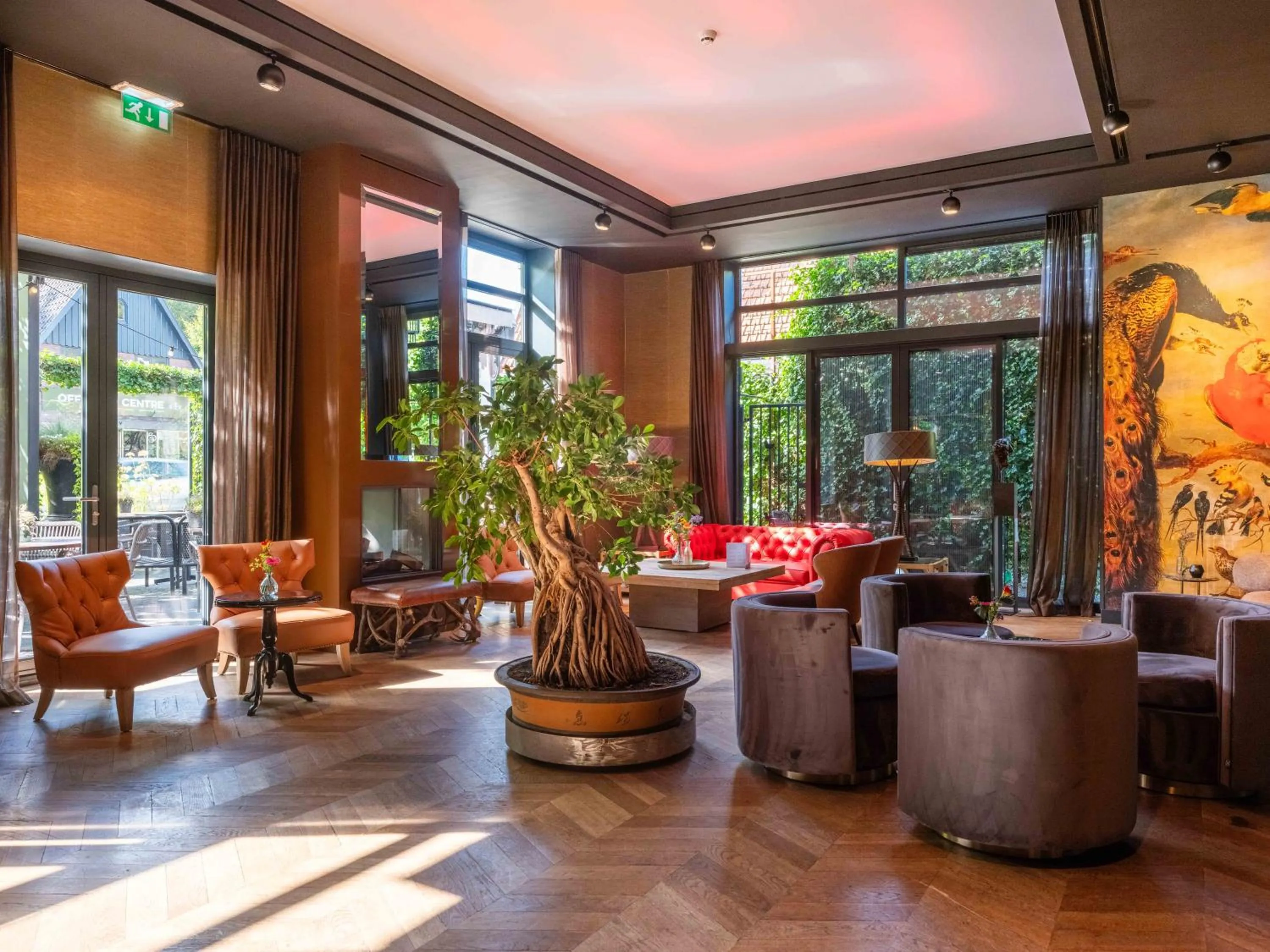 Communal lounge/ TV room in Restaurant Hotel Merlet