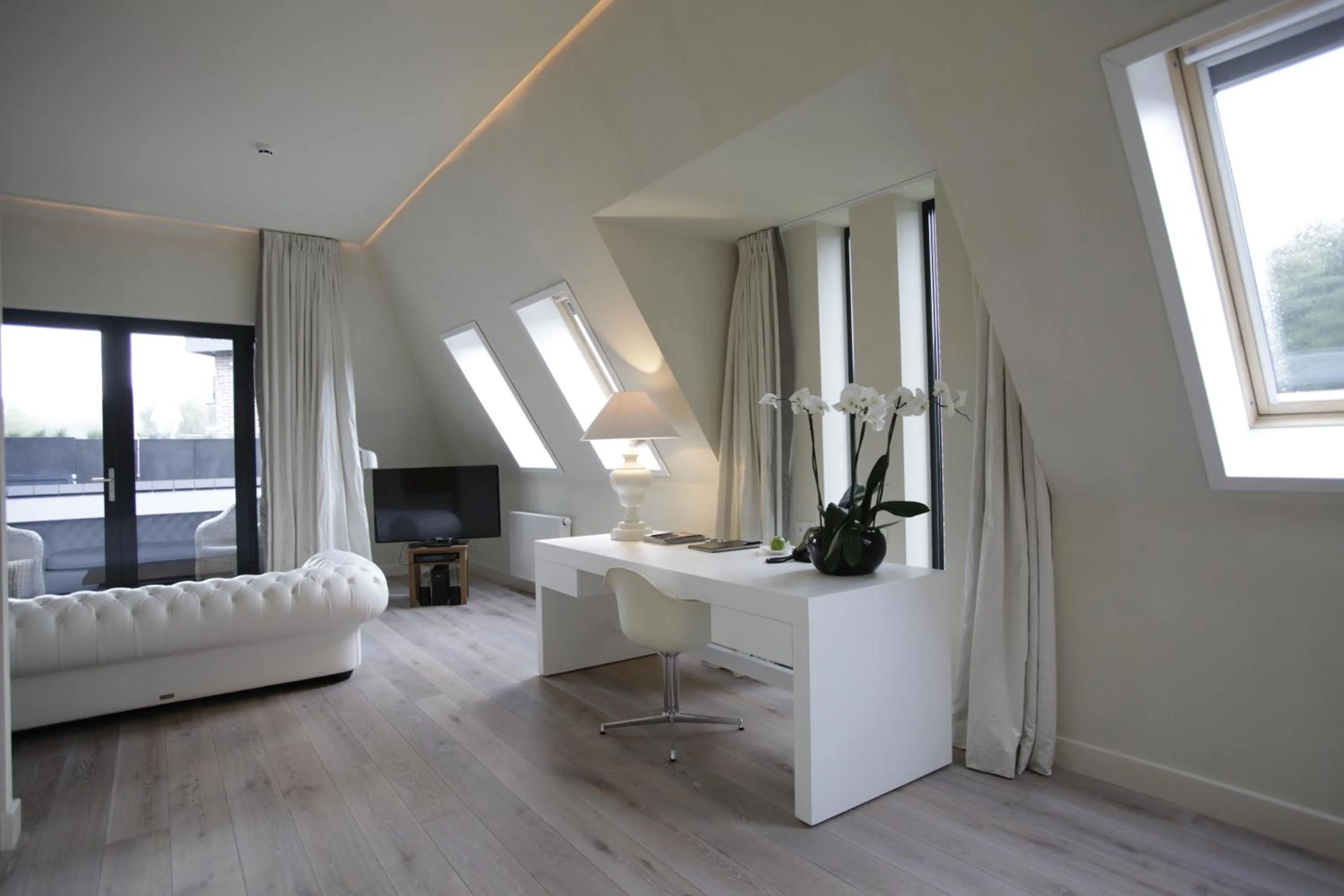 Seating area in Restaurant Hotel Merlet