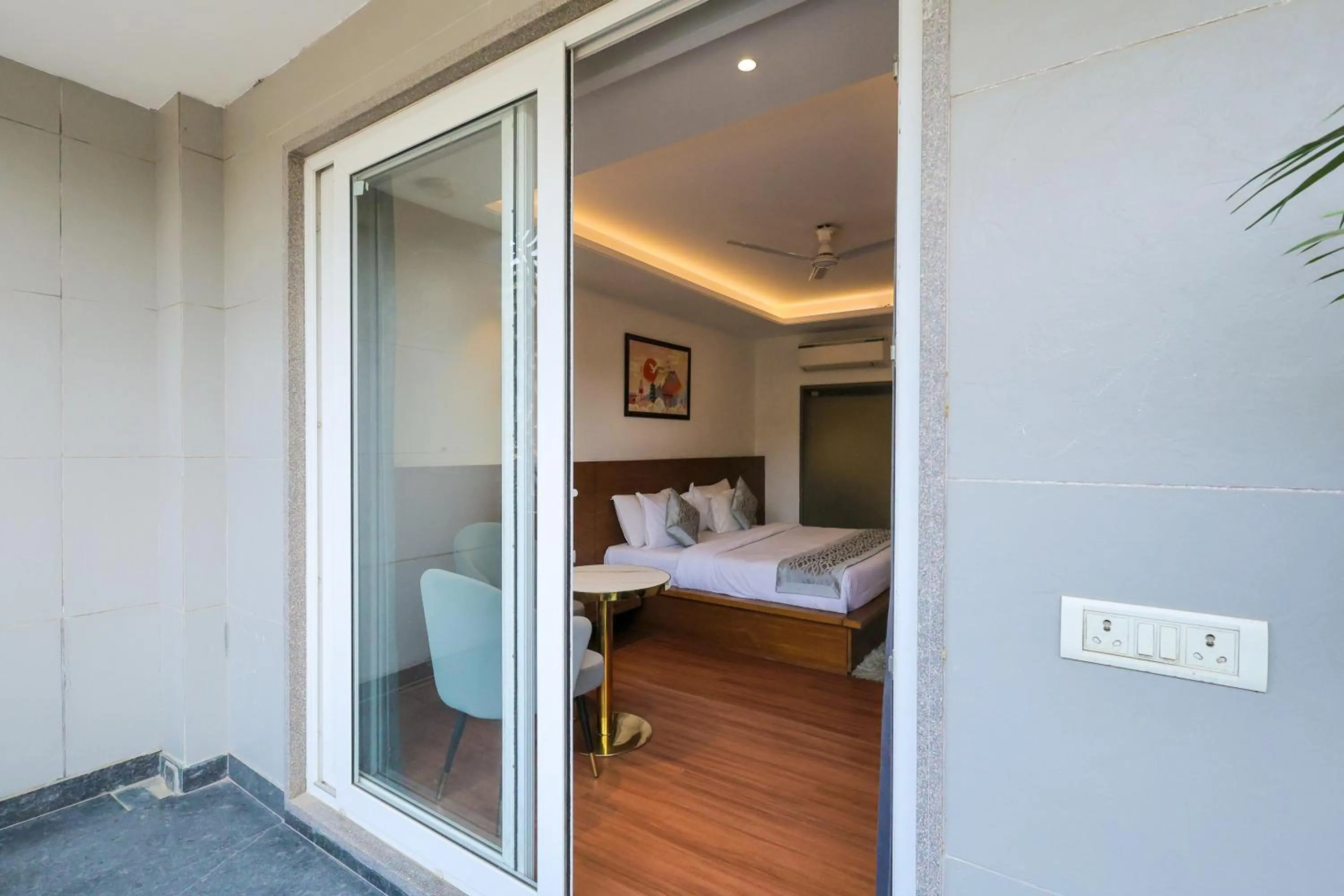 Balcony/Terrace, Bed in Nikko Premier - Near Medanta Hospital