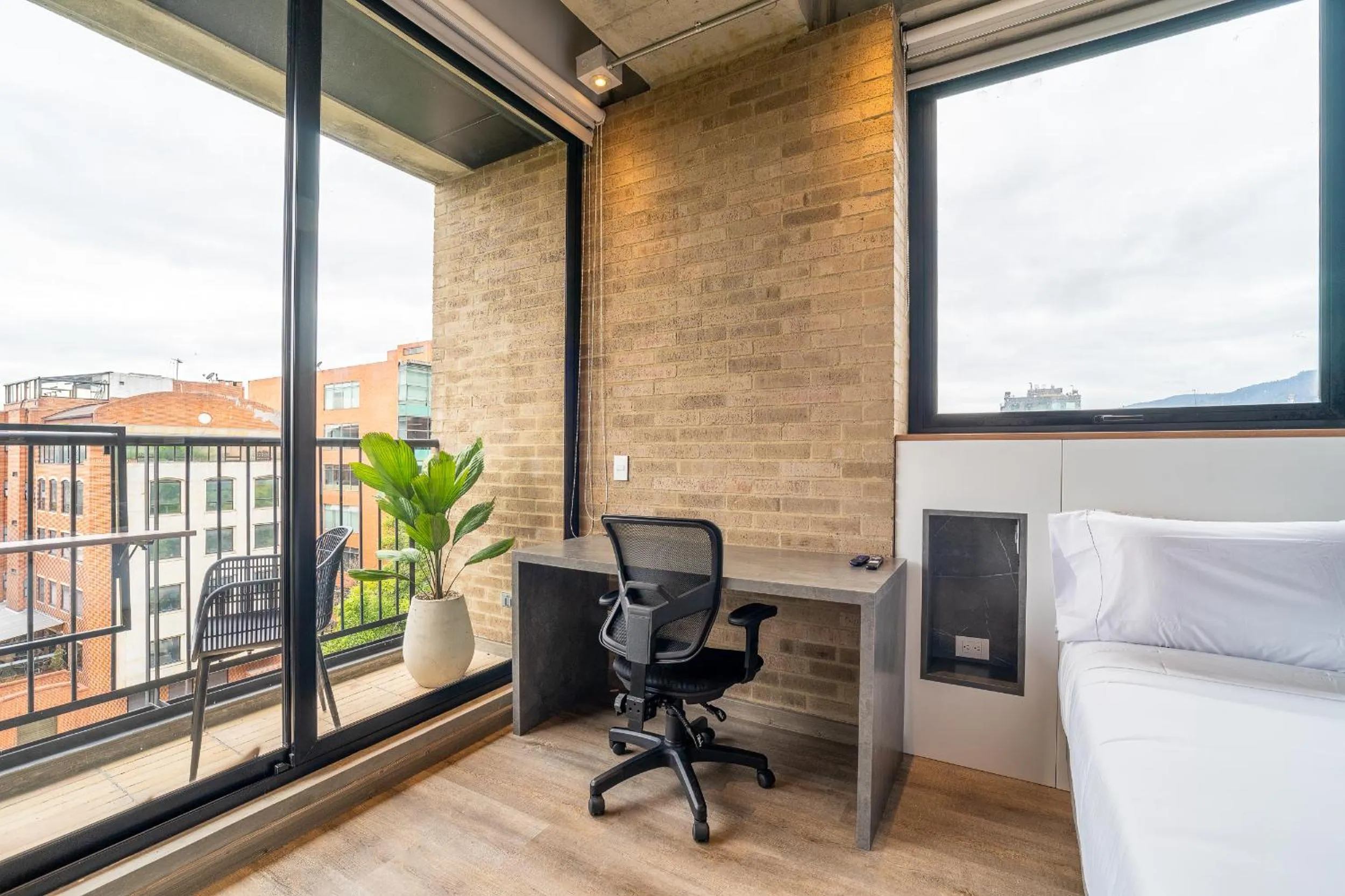 Seating area in Canvas By Wynwood House