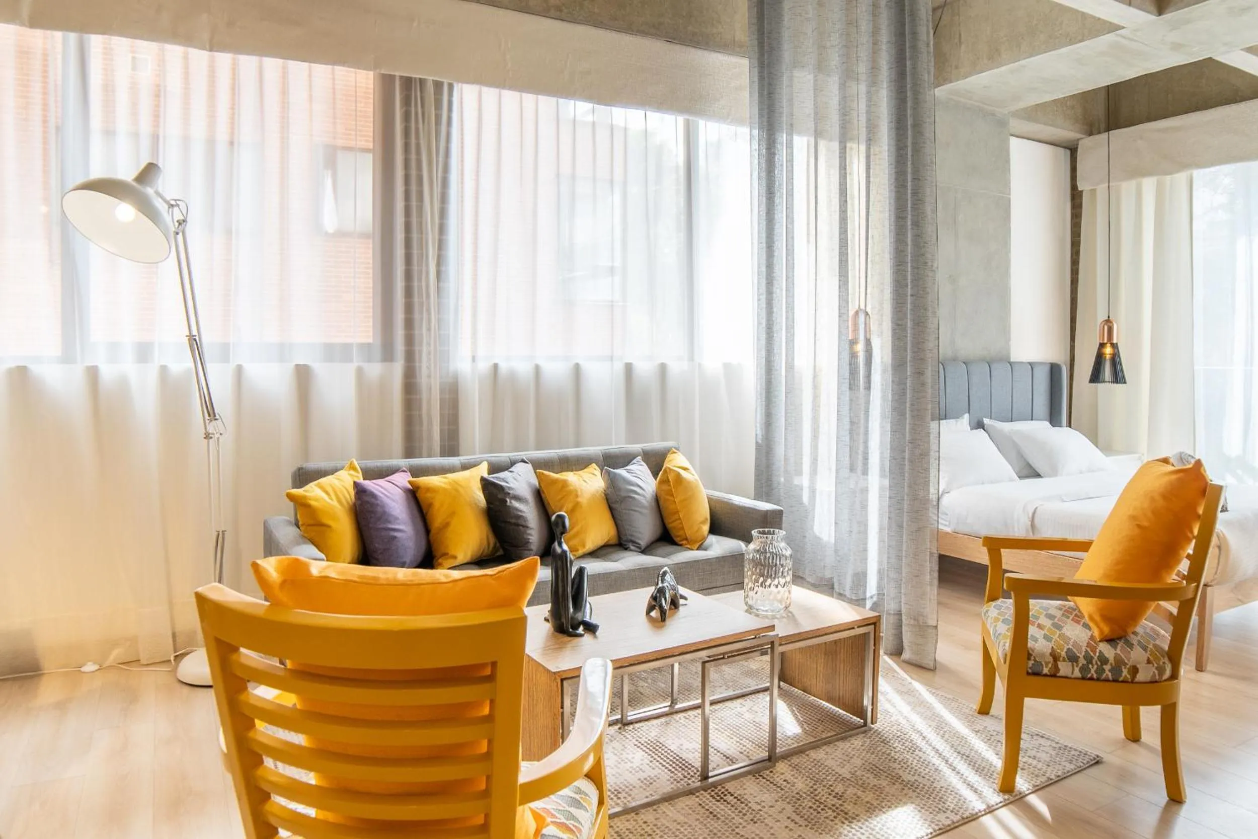 Seating area in Canvas By Wynwood House