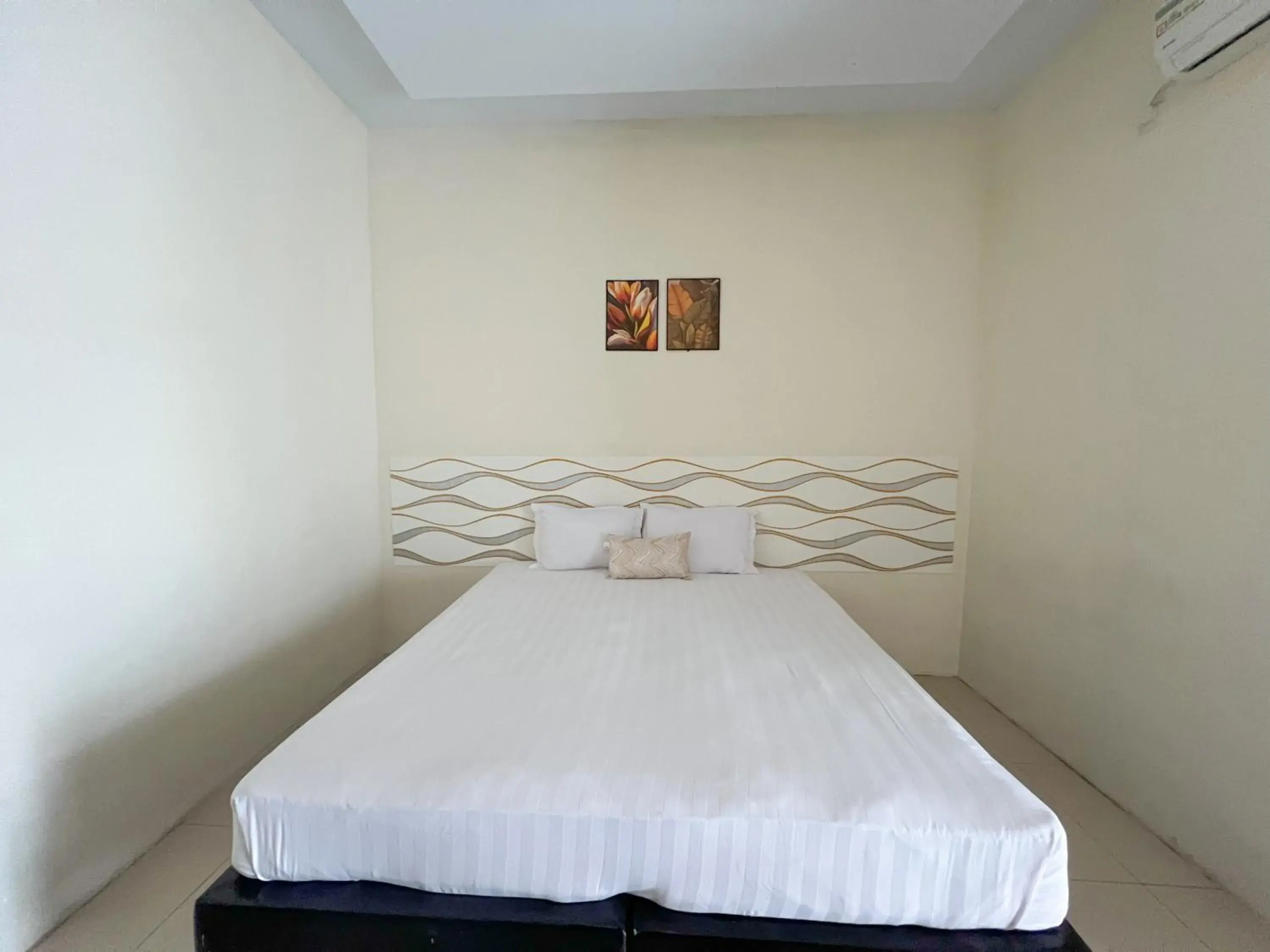 Standard Double Room in Filia Syariah Homestay Palu RedPartner Standard Double Room in Filia Syariah Homestay Palu RedPartner