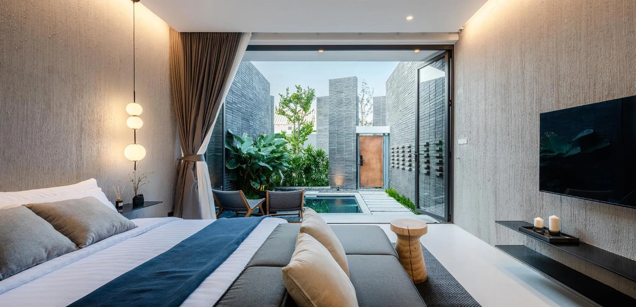 Bed in Rhy.a Private Pool Villa