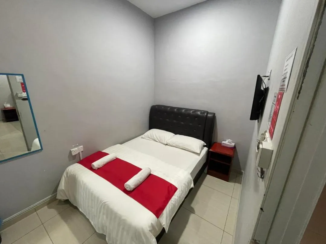 Bed in SZA INN HOTEL