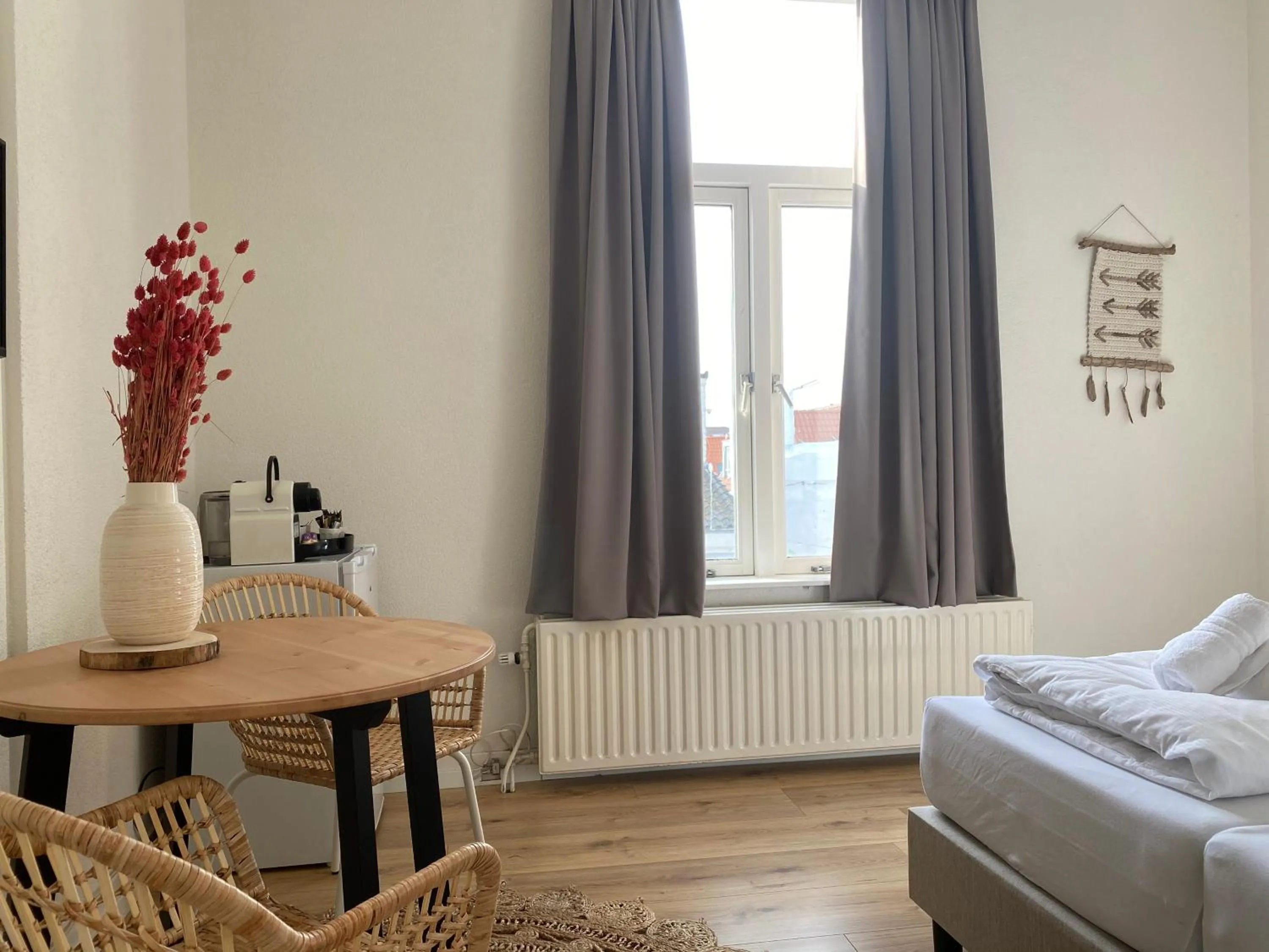 Seating area, Bed in Hotel Doppenberg