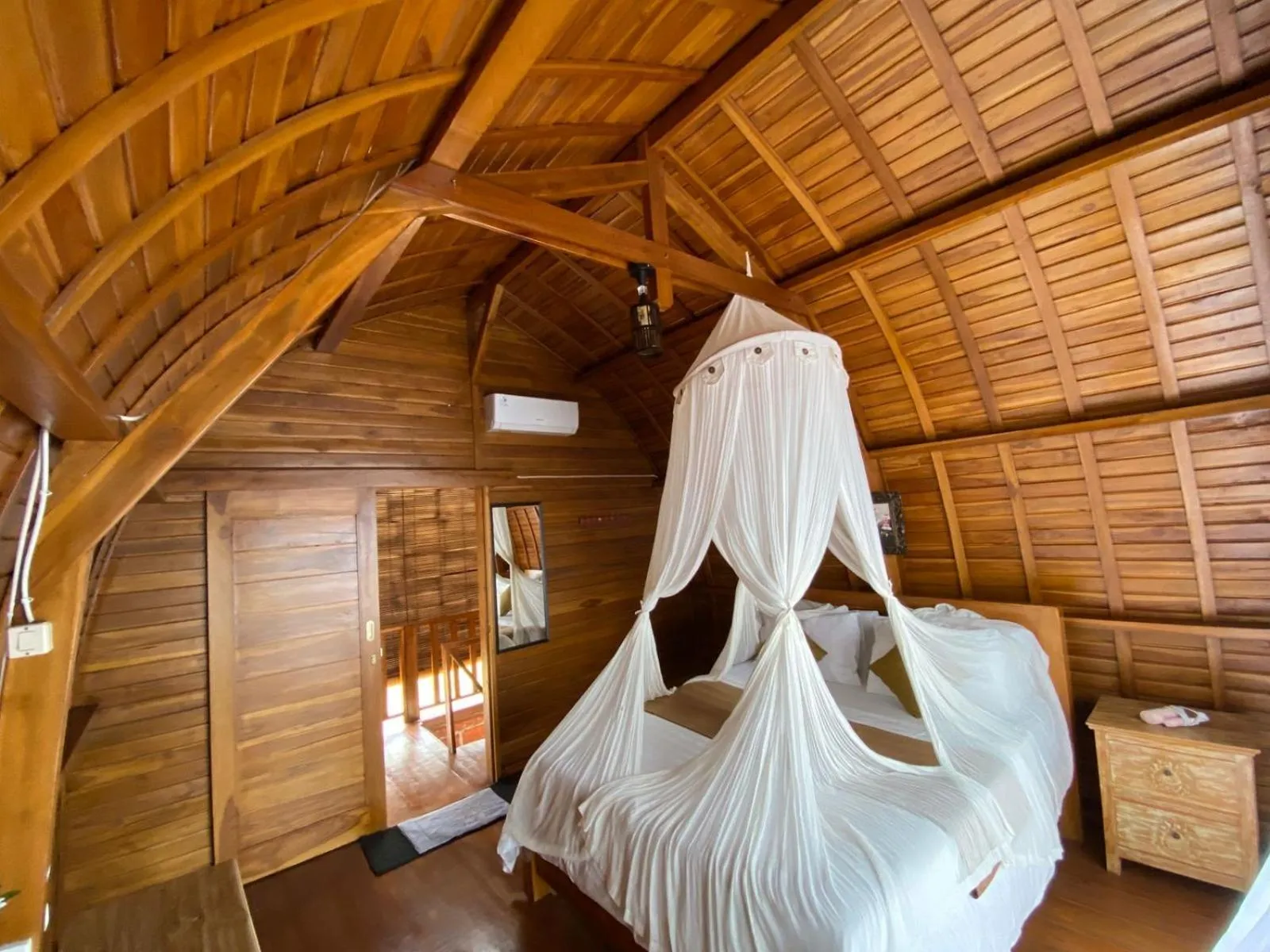 Bed in Suwehan Beach Cliff House by BIJAK