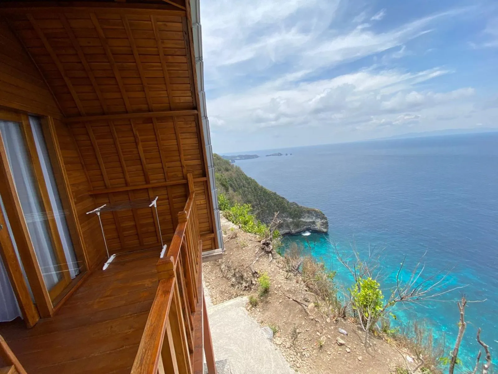 Suwehan Beach Cliff House by BIJAK