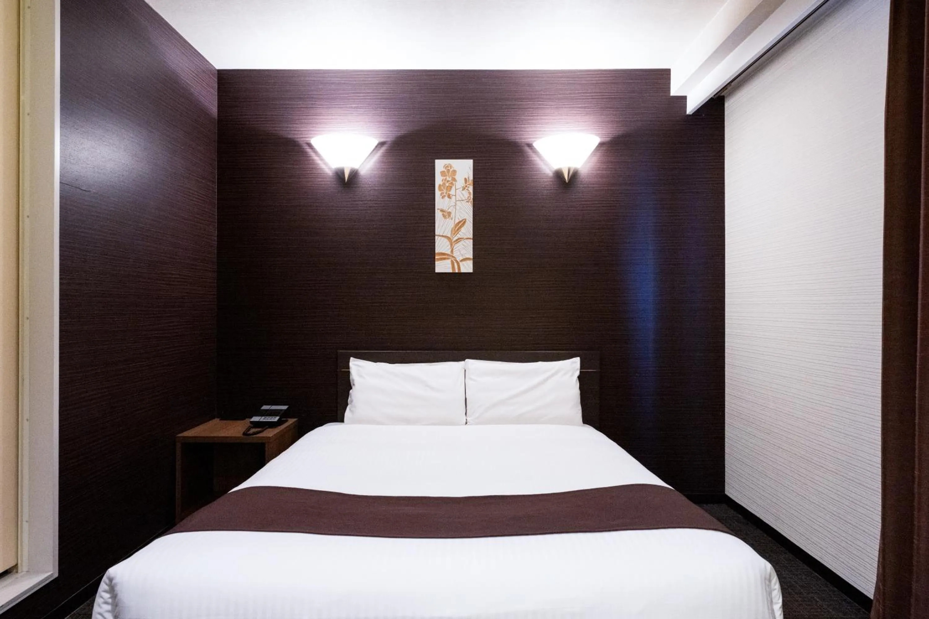 Photo of the whole room, Bed in Urvest Hotel Kamata