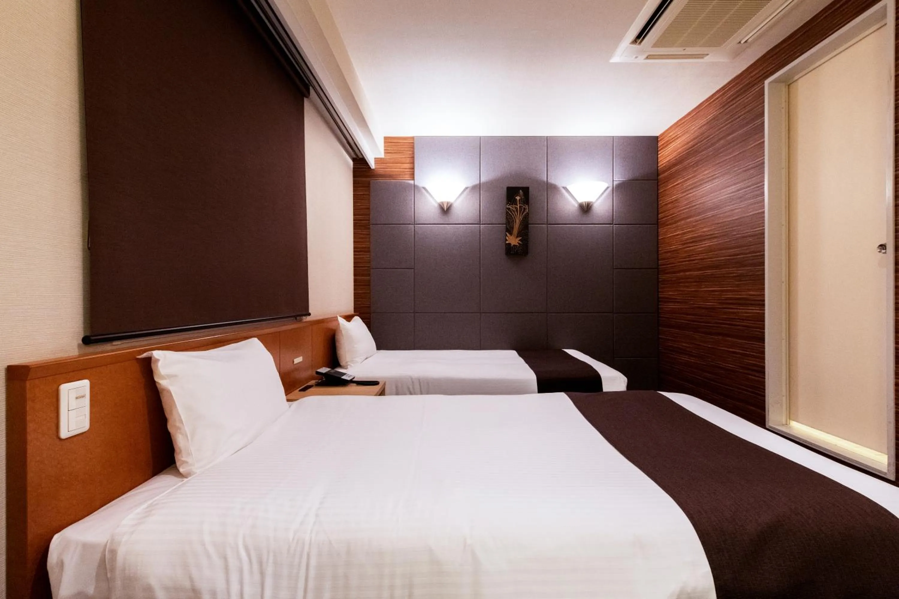 Photo of the whole room, Bed in Urvest Hotel Kamata