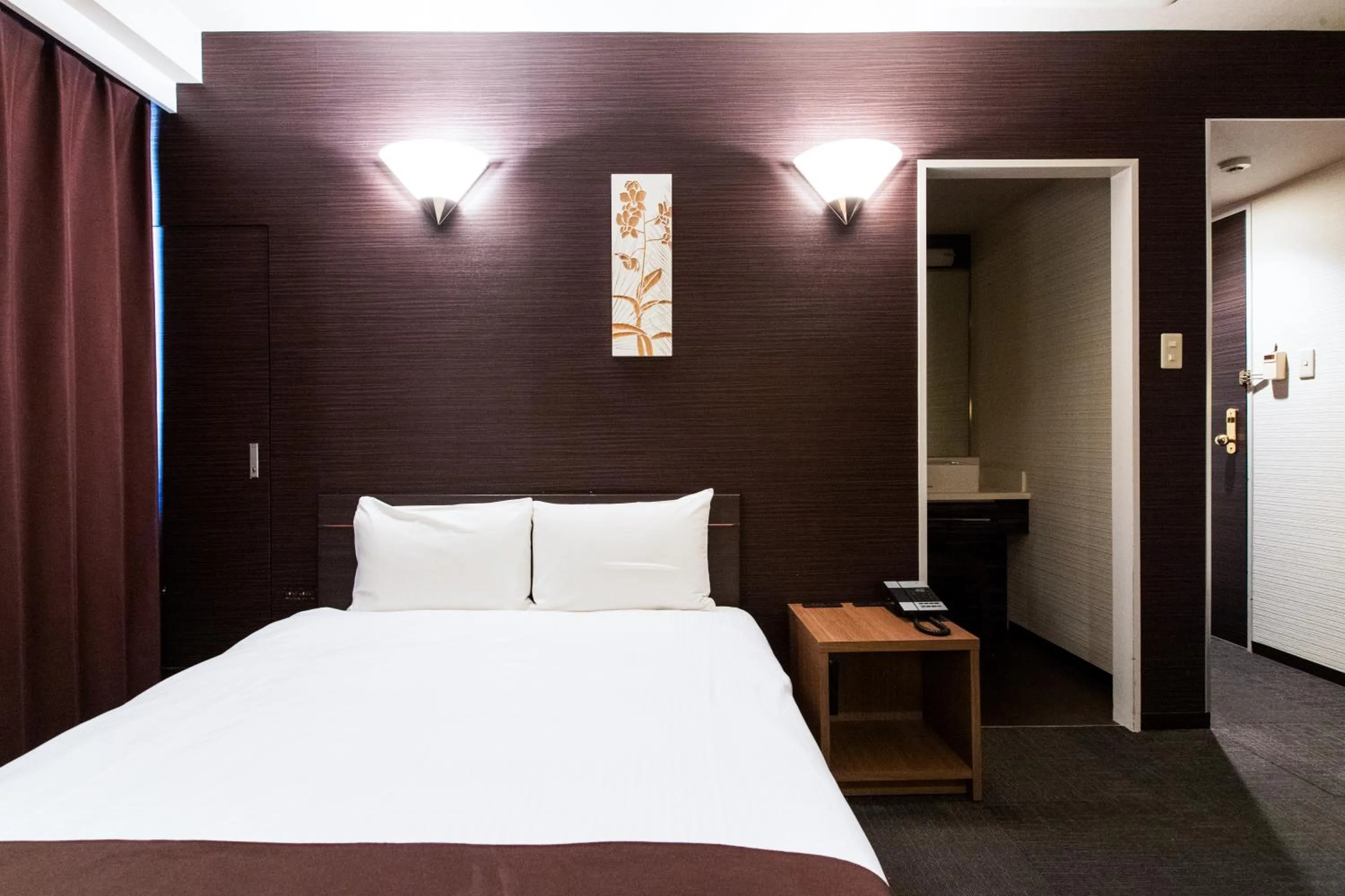Photo of the whole room, Bed in Urvest Hotel Kamata
