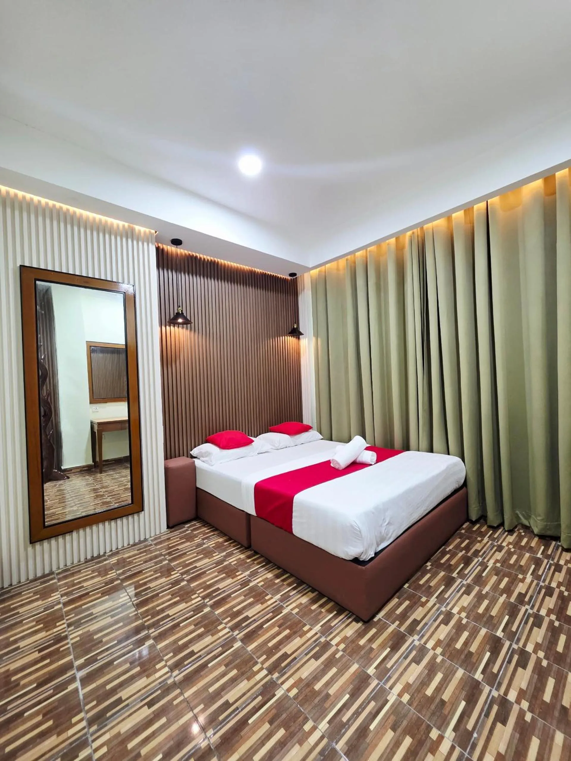 Bed in Grand Inn Hotel Semporna