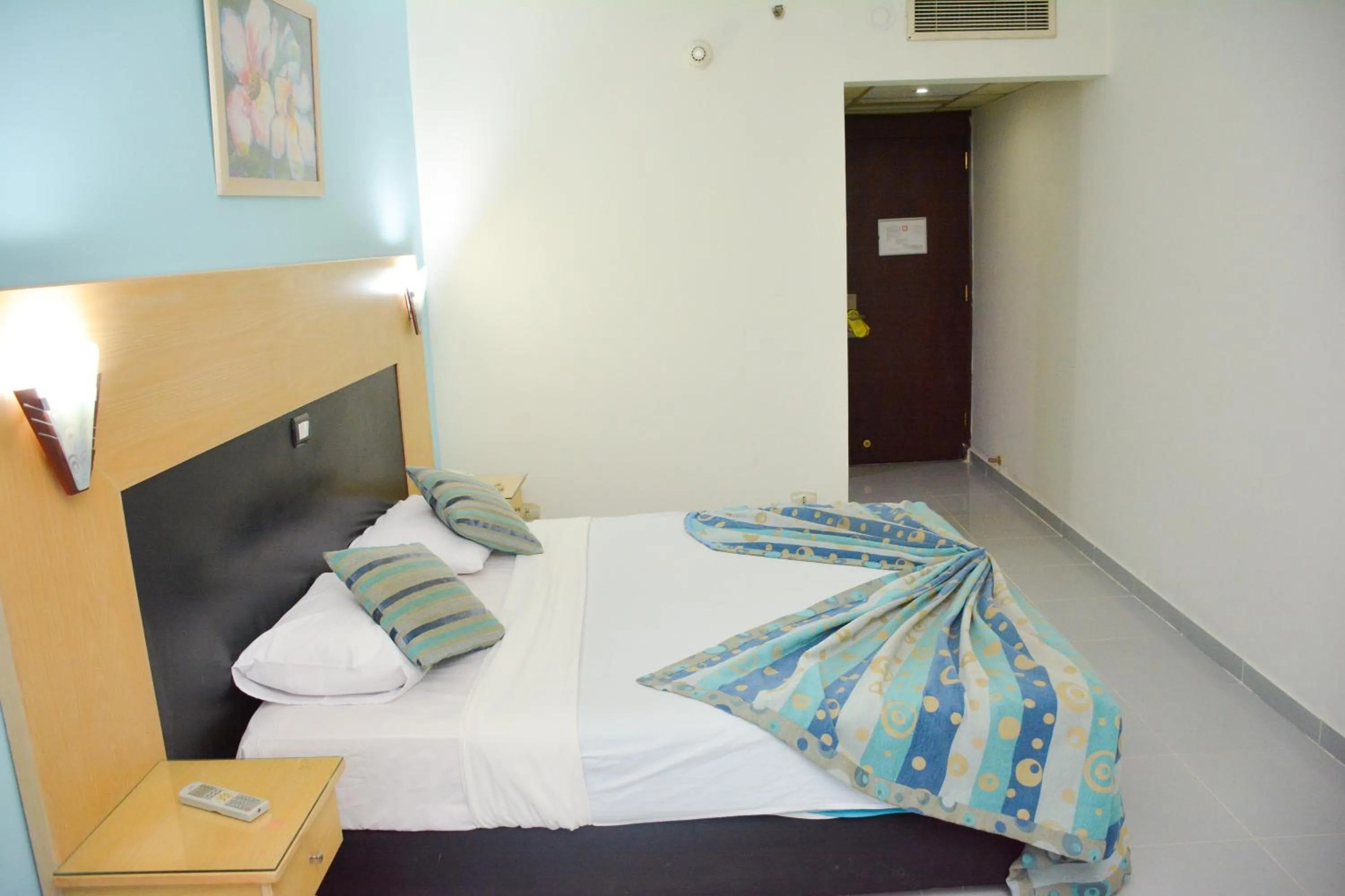 Bed in Aracan Pyramid Hotel