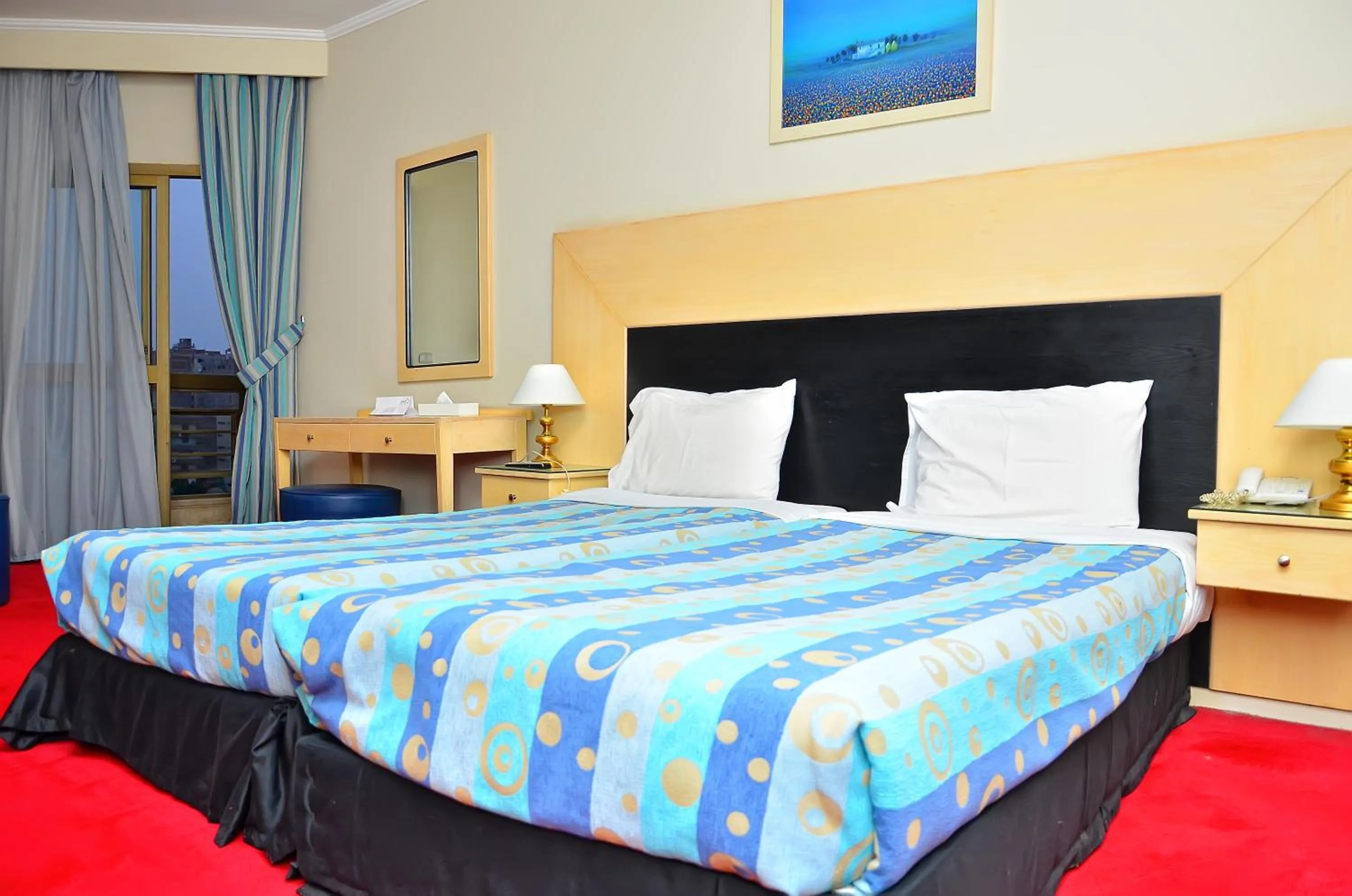 Bed in Aracan Pyramid Hotel