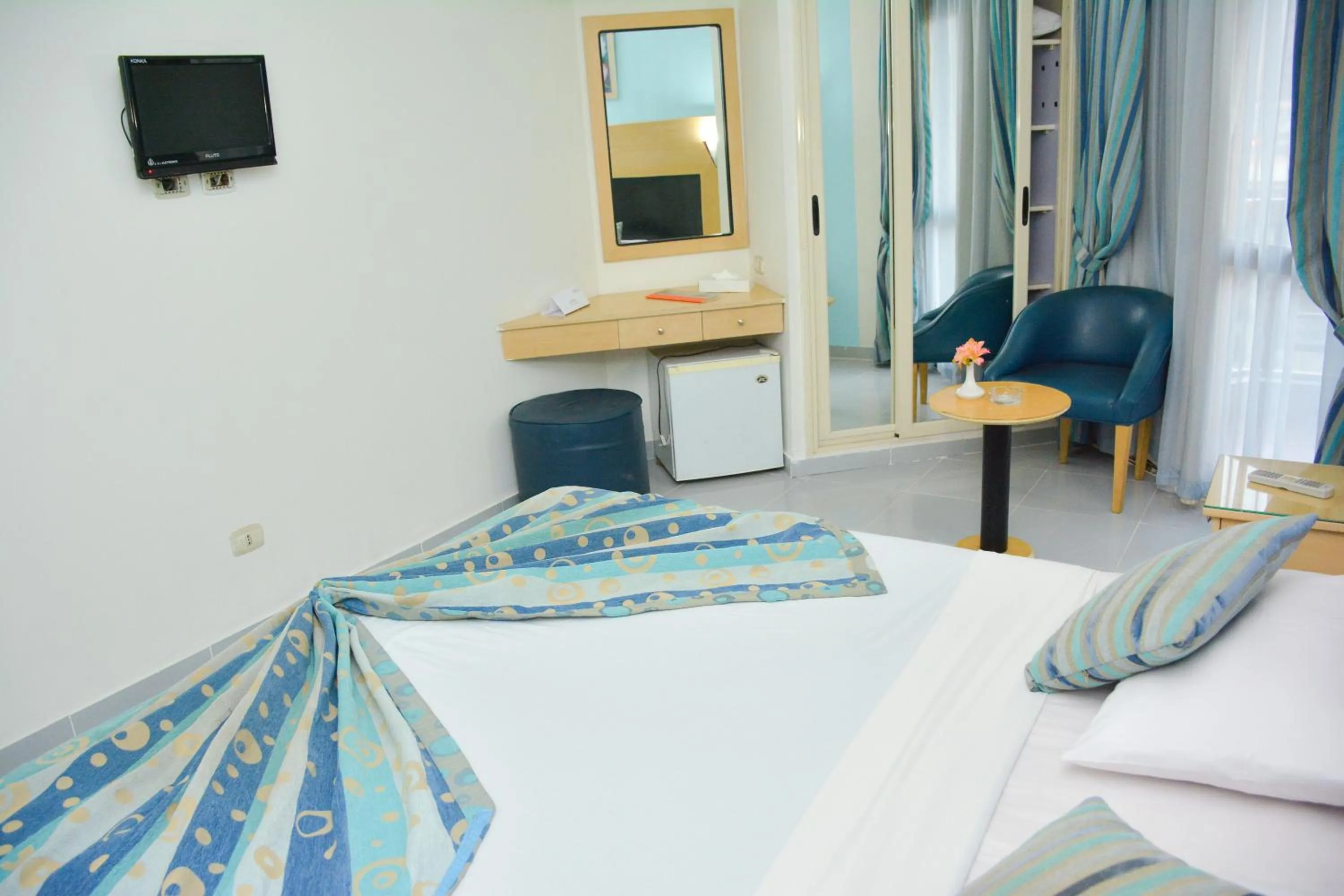 Bed in Aracan Pyramid Hotel