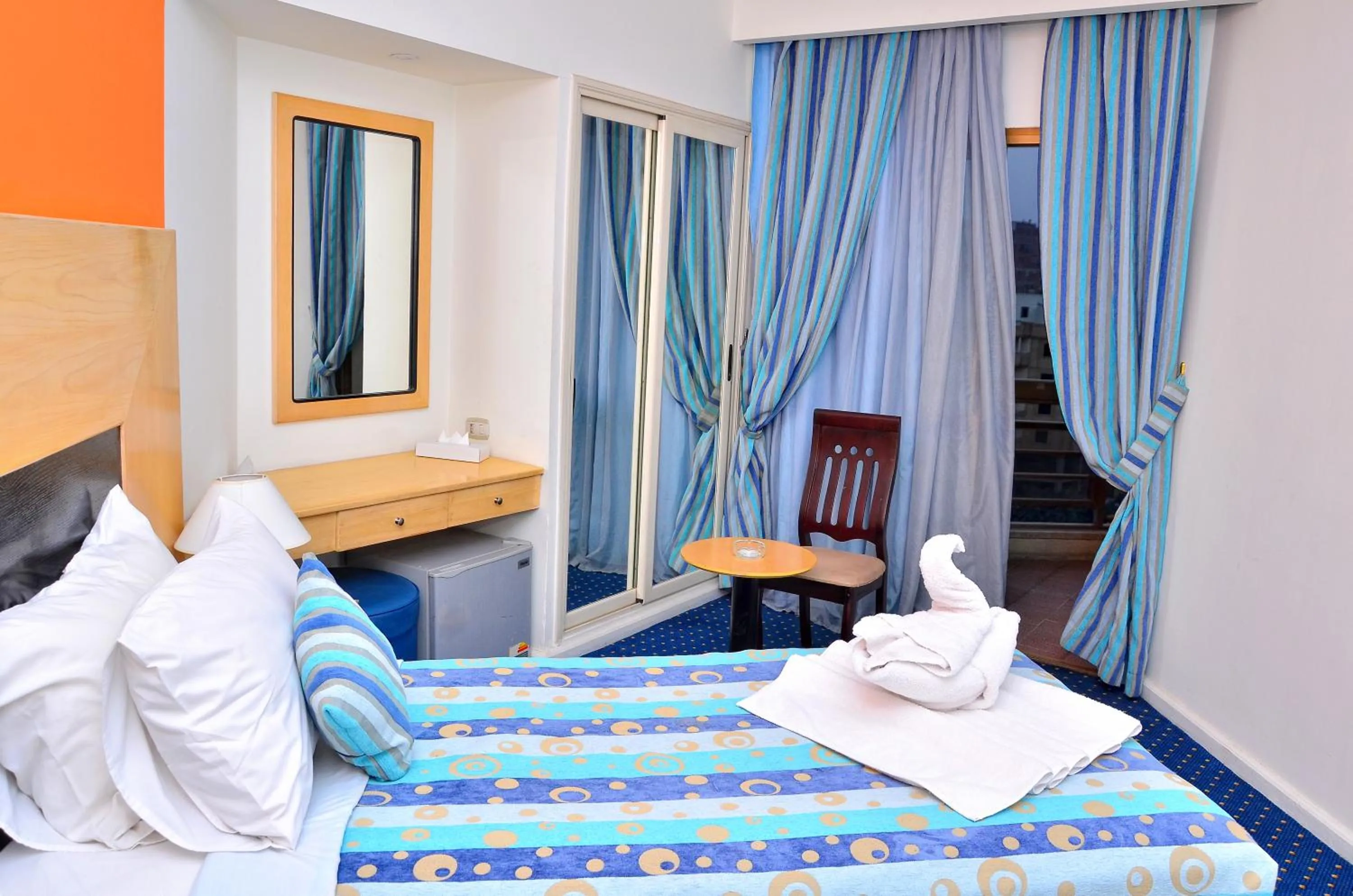 Bed in Aracan Pyramid Hotel