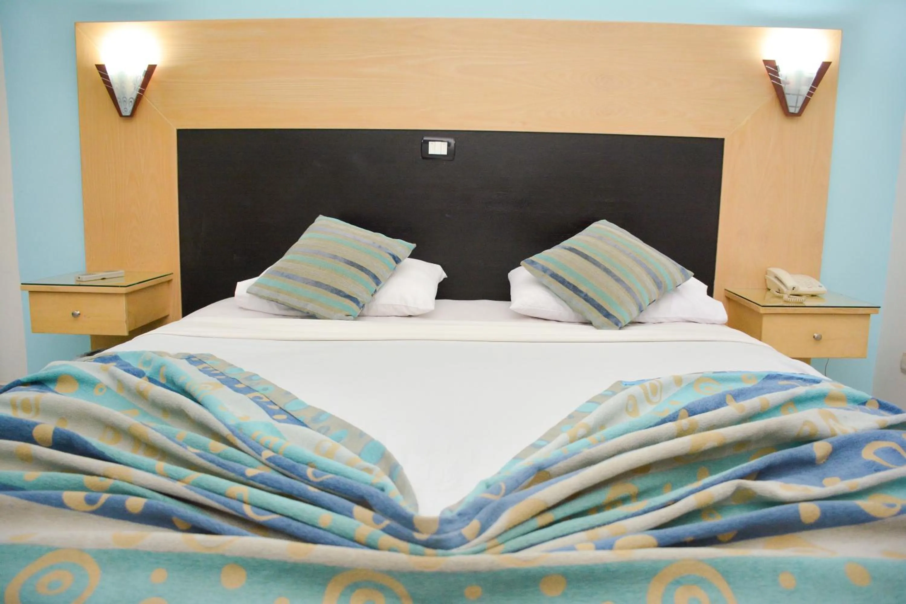 Bed in Aracan Pyramid Hotel