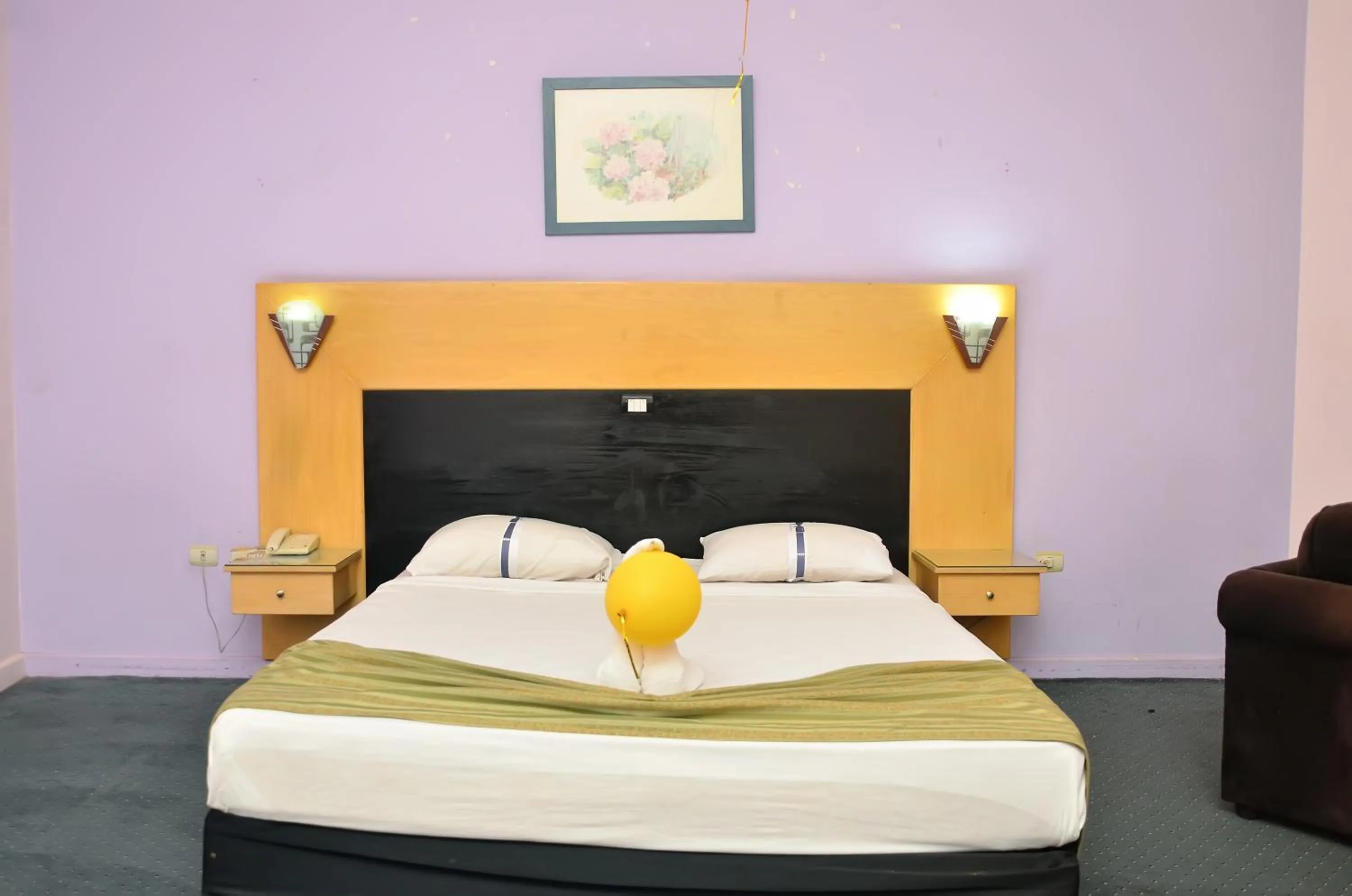 Bed in Aracan Pyramid Hotel