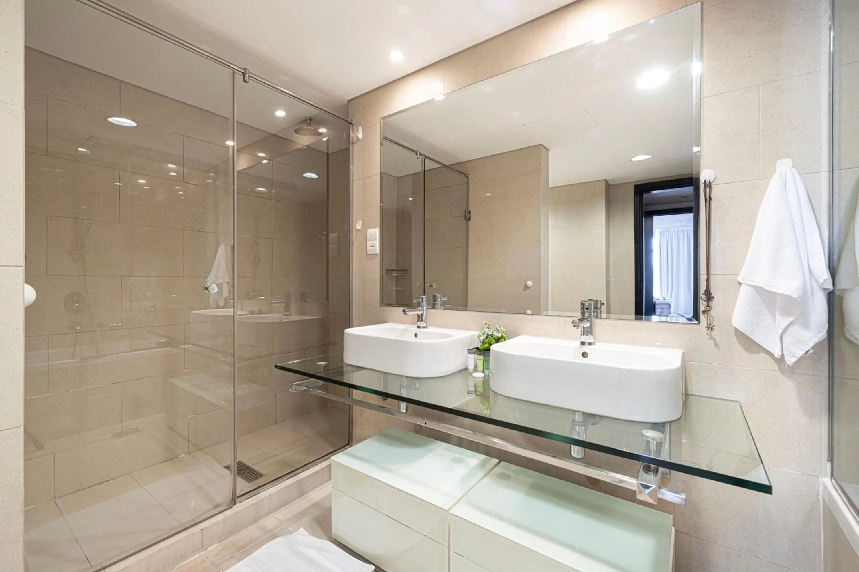 Bathroom in Whispers of the Wind by Lagom Vacation Homes