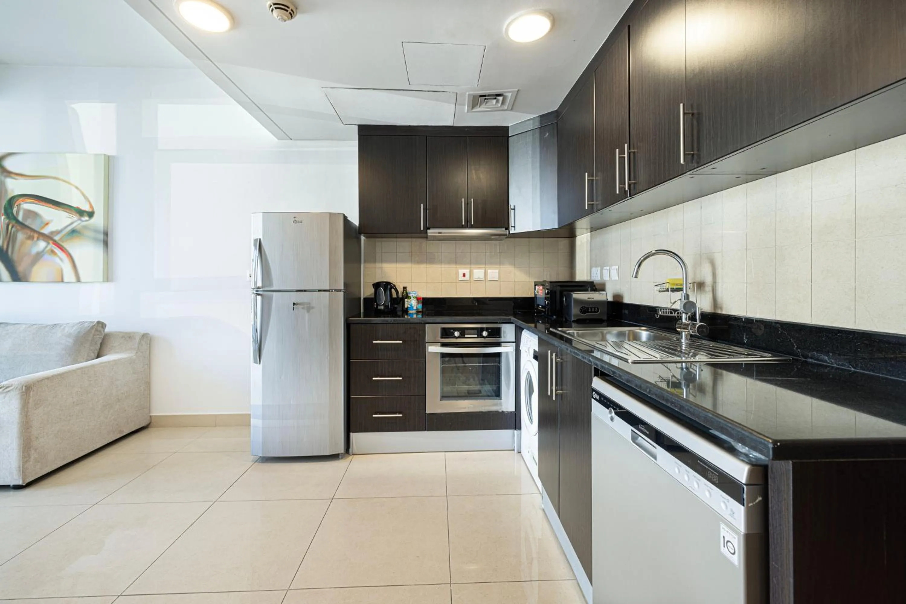 kitchen in Whispers of the Wind by Lagom Vacation Homes