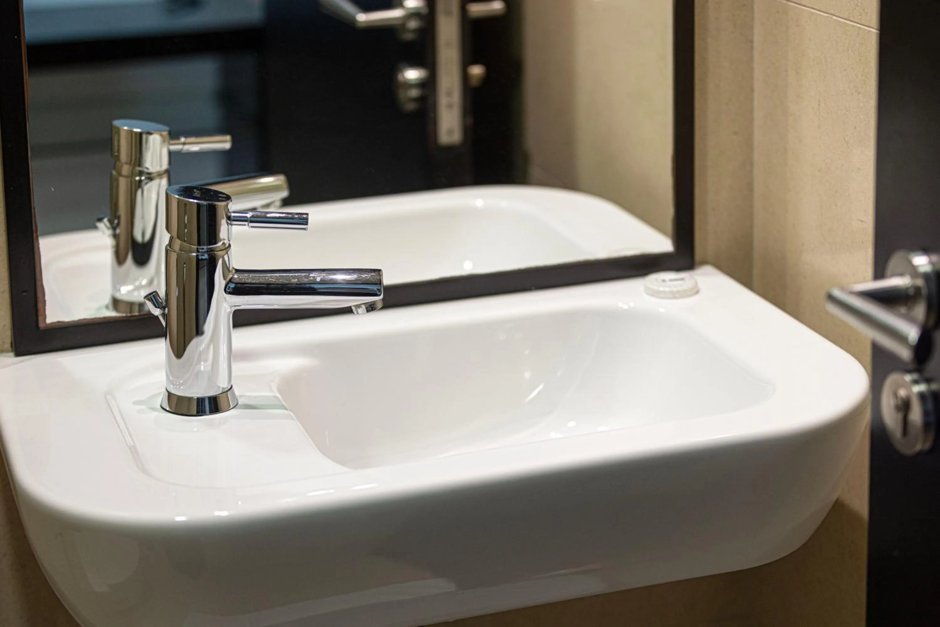 Bathroom in Whispers of the Wind by Lagom Vacation Homes