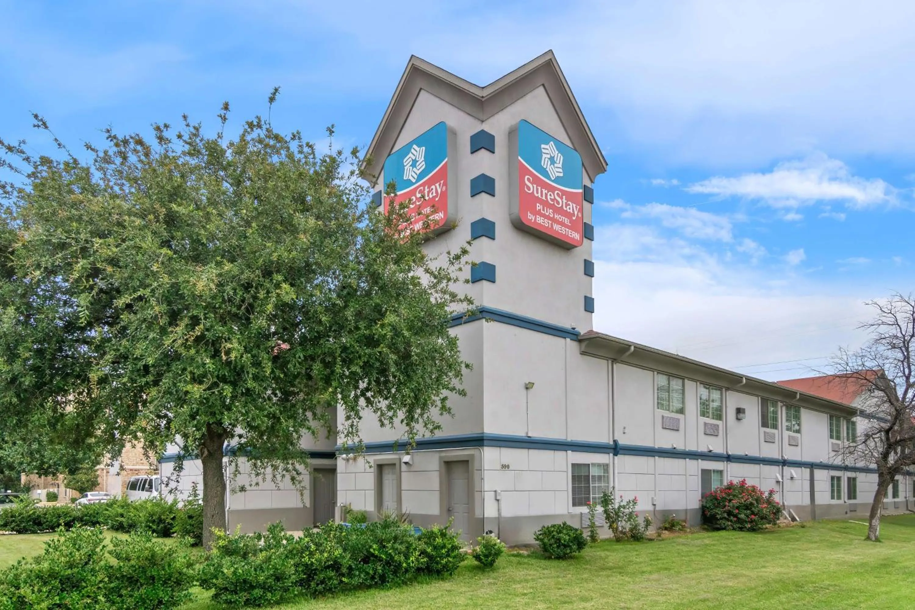 Property building in SureStay Plus by Best Western Fort Worth Benbrook