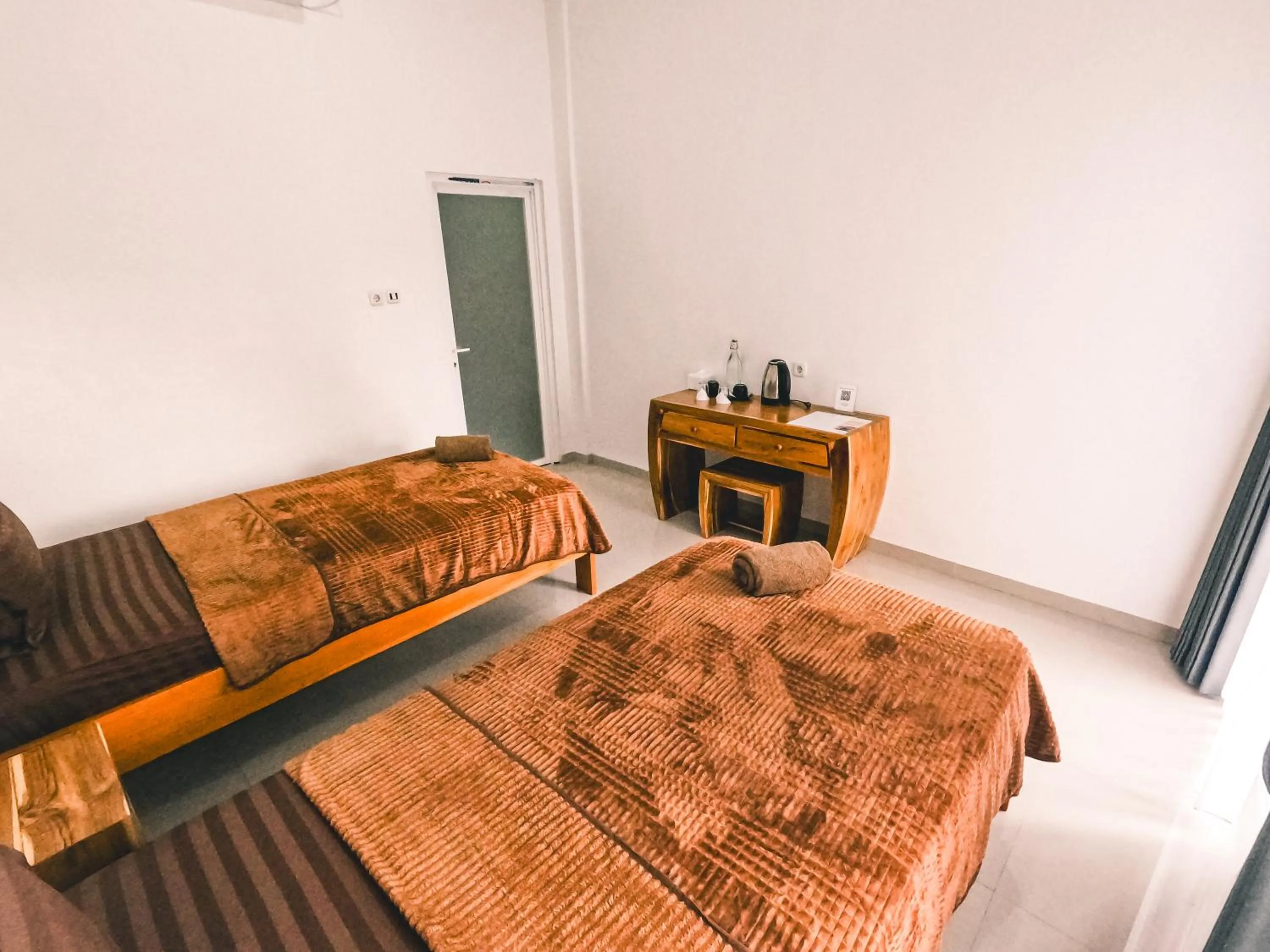 Bed in Zavana rooms & Restaurant