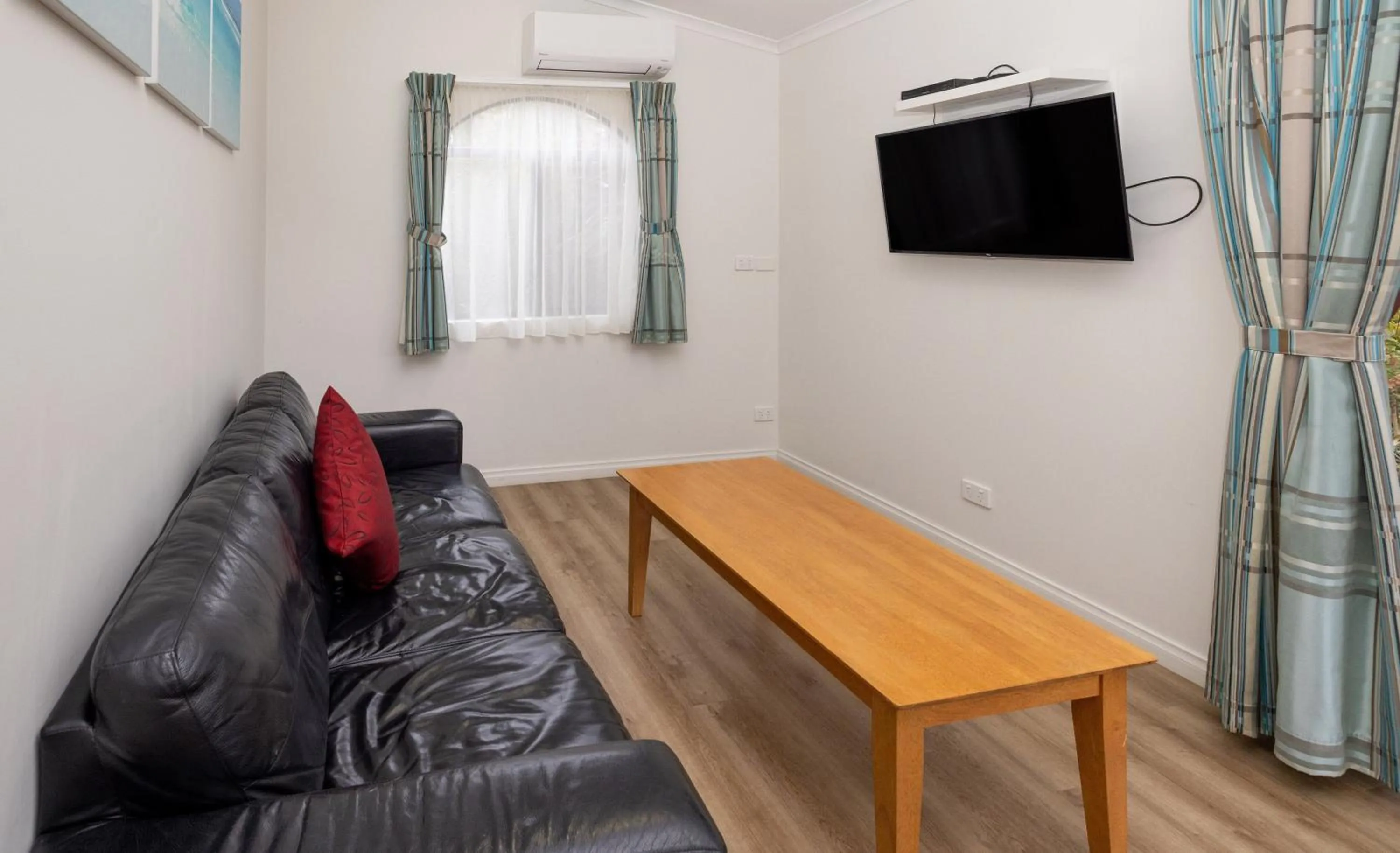 Living room in BIG4 Emu Beach Holiday Park