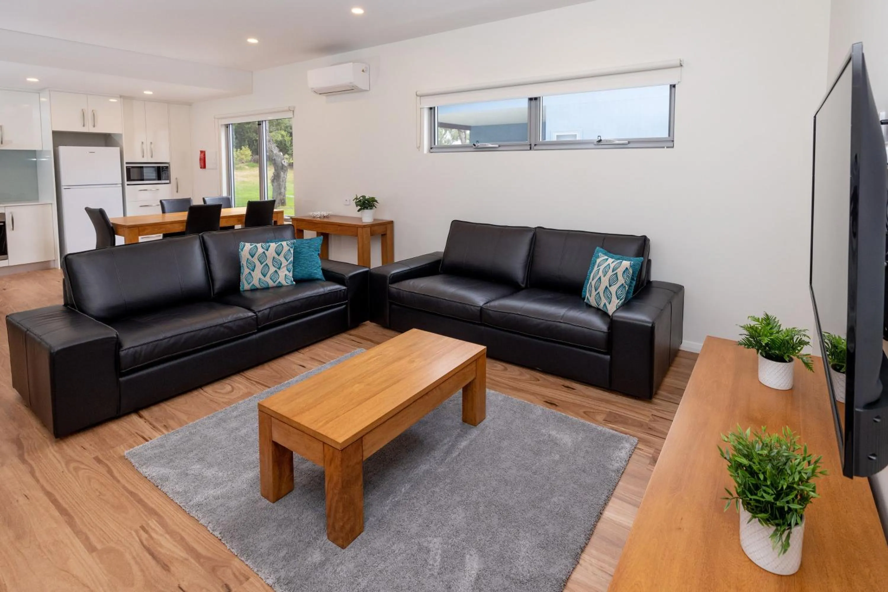 Living room in BIG4 Emu Beach Holiday Park