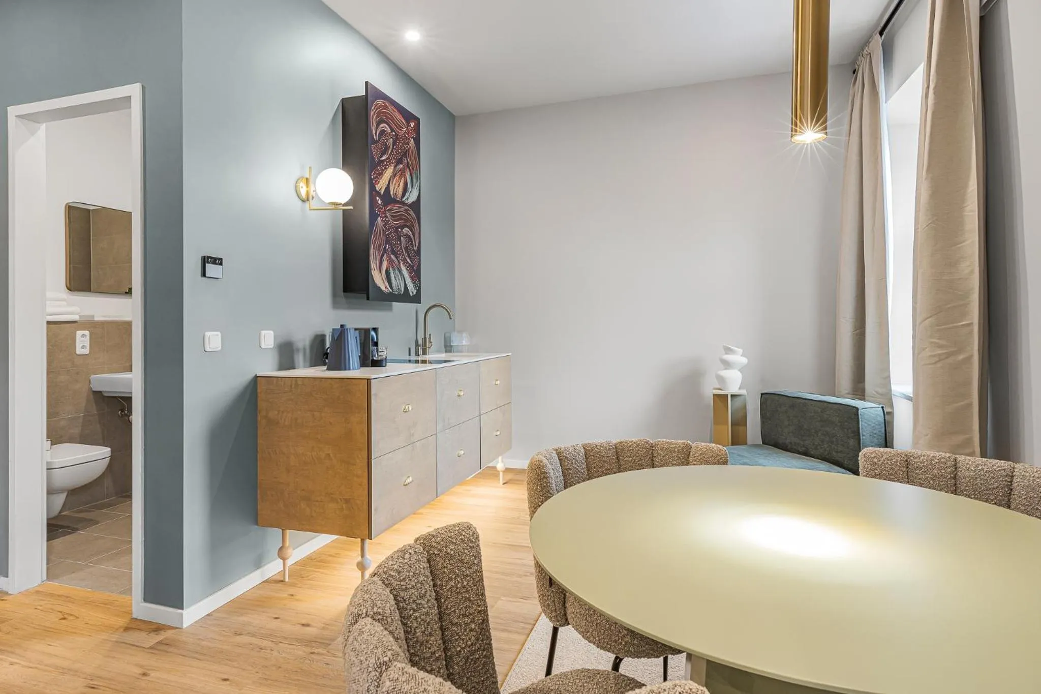 Living room in kalm stay - a design Aparthotel